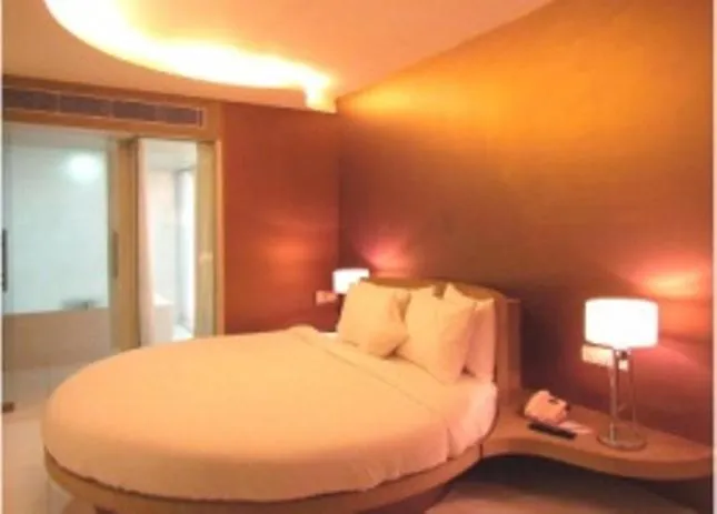 Bed in Cocoon Luxury Business Hotel