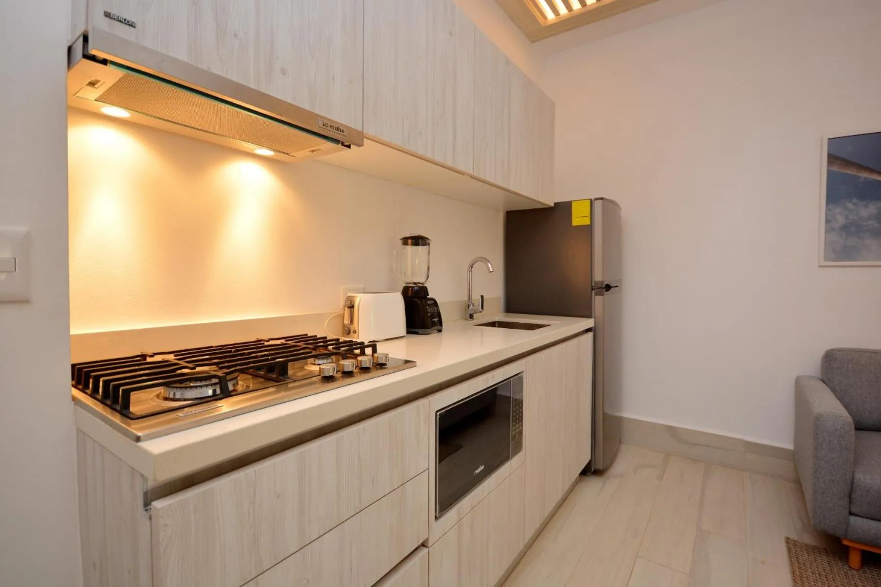 Kitchen or kitchenette in MAYAN MONK Suites