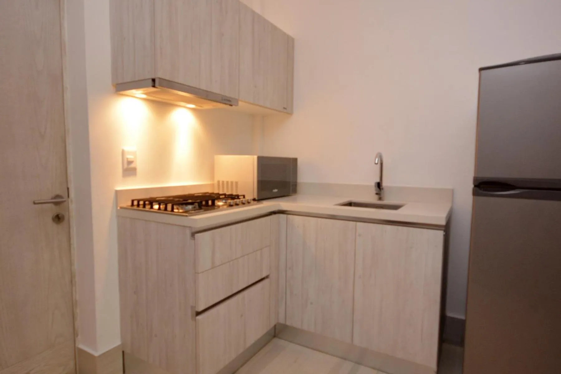 Kitchen or kitchenette in MAYAN MONK Suites