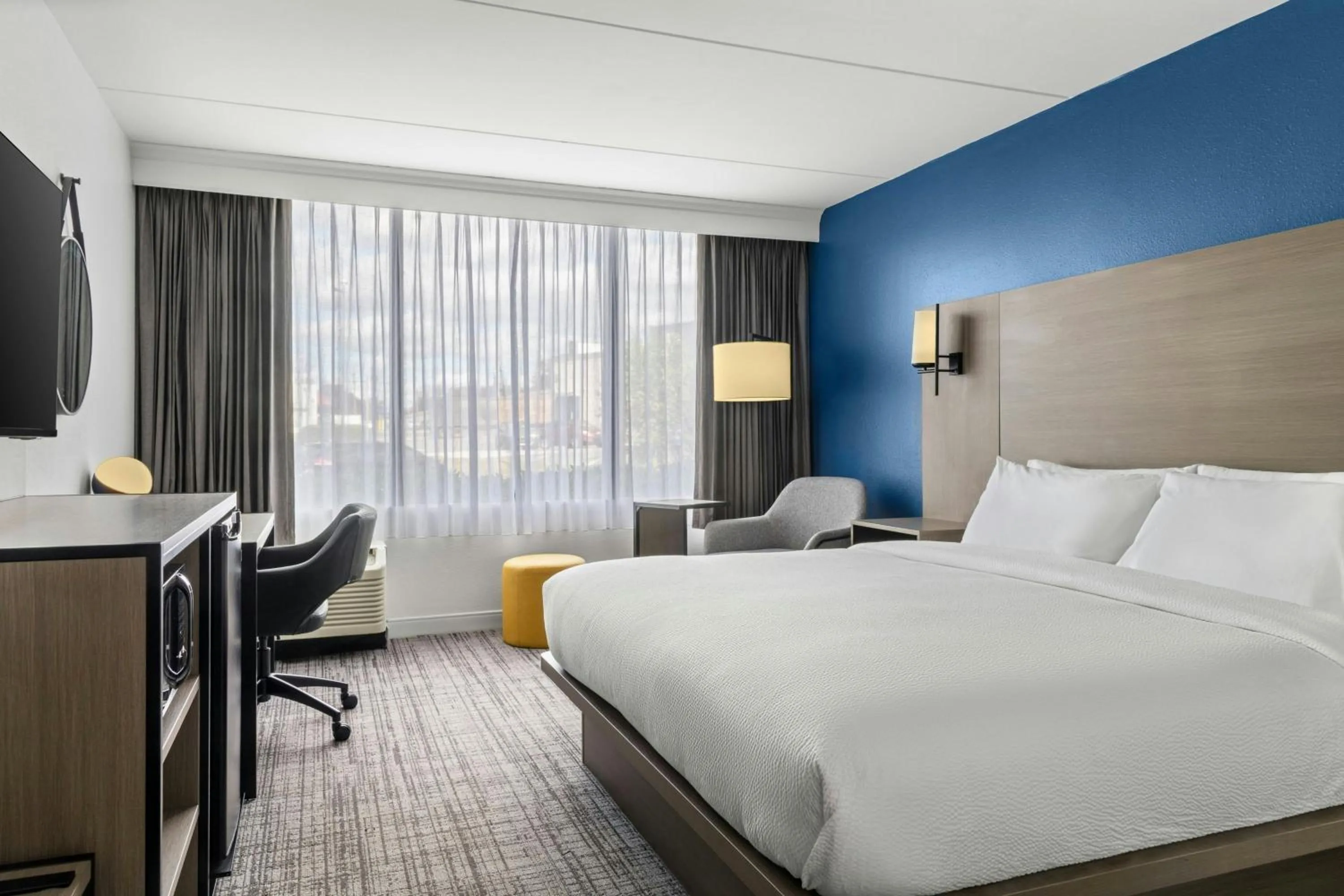 Photo of the whole room, Bed in City Express by Marriott Charlotte South End