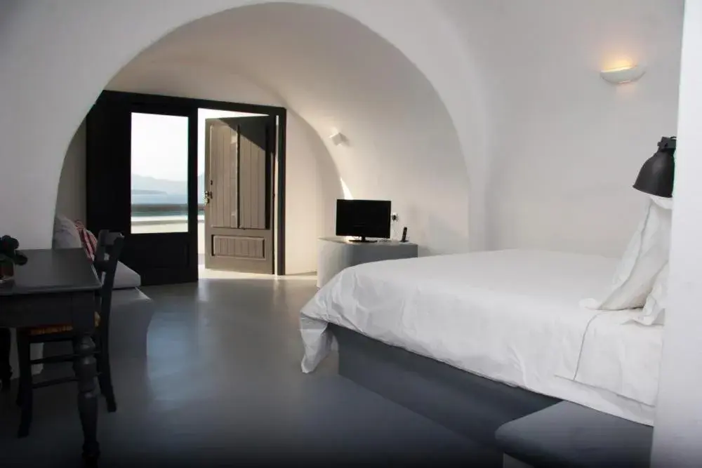 Photo of the whole room, Bed in Grand Ambassador Santorini Hotel Photo of the whole room, Bed in Grand Ambassador Santorini Hotel