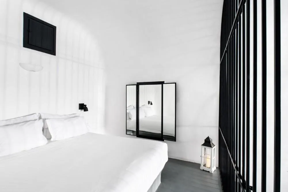 Photo of the whole room, Bed in Grand Ambassador Santorini Hotel