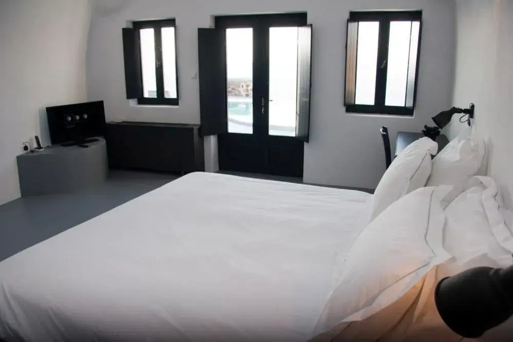 Photo of the whole room, Bed in Grand Ambassador Santorini Hotel Photo of the whole room, Bed in Grand Ambassador Santorini Hotel