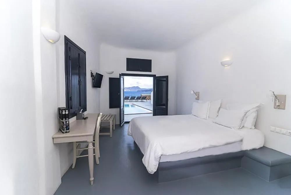 Photo of the whole room, Bed in Grand Ambassador Santorini Hotel