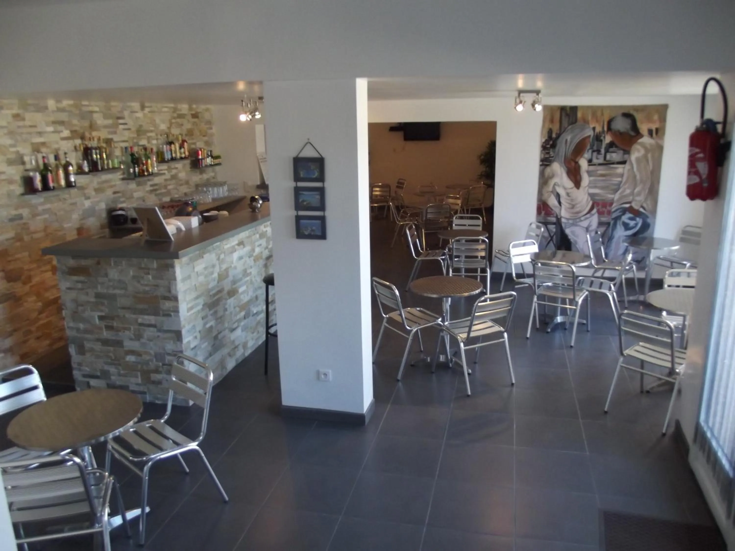 Lounge or bar in Hôtel "U Nebbiu"