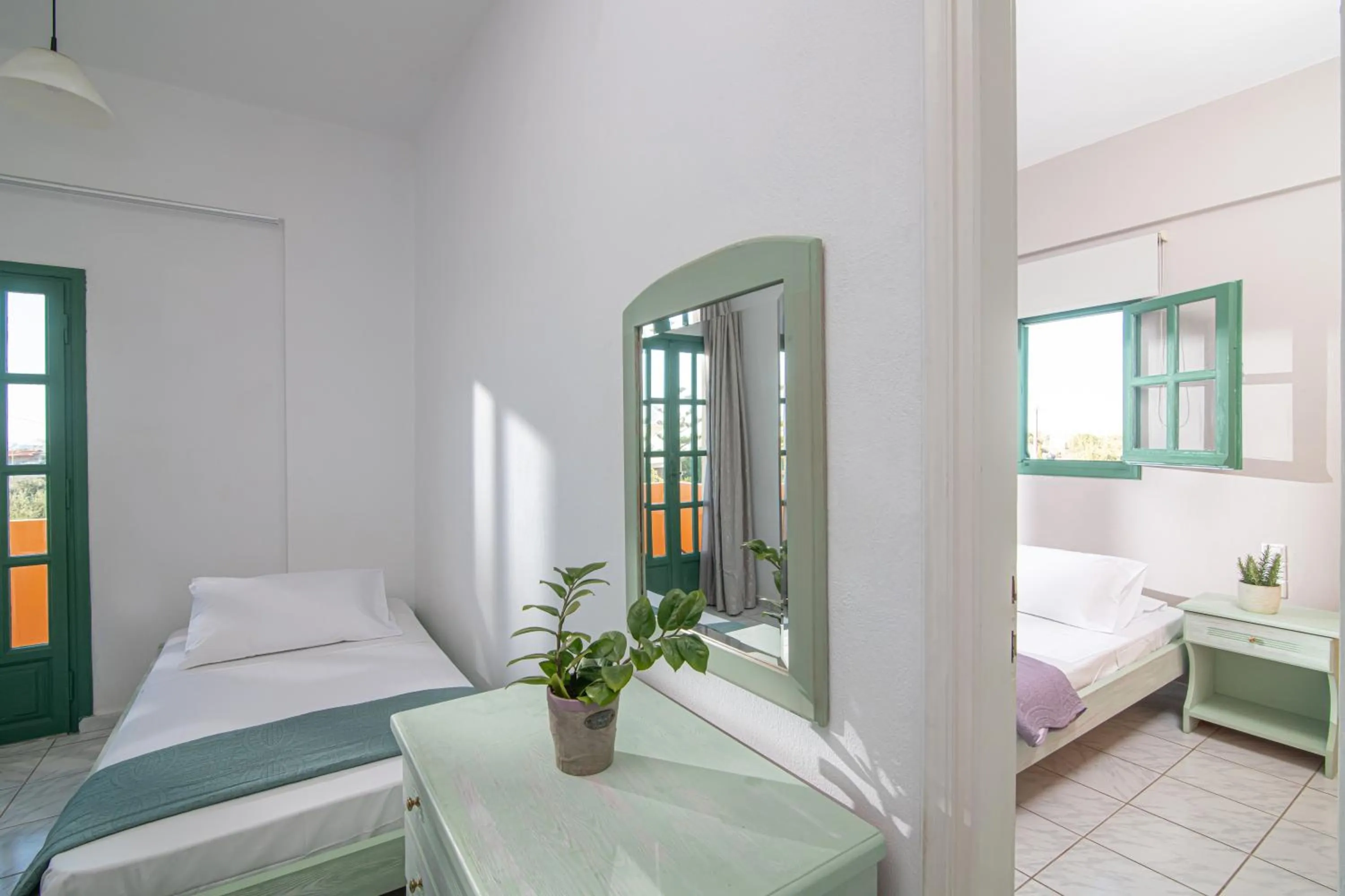 Bed in Portokali Apartments