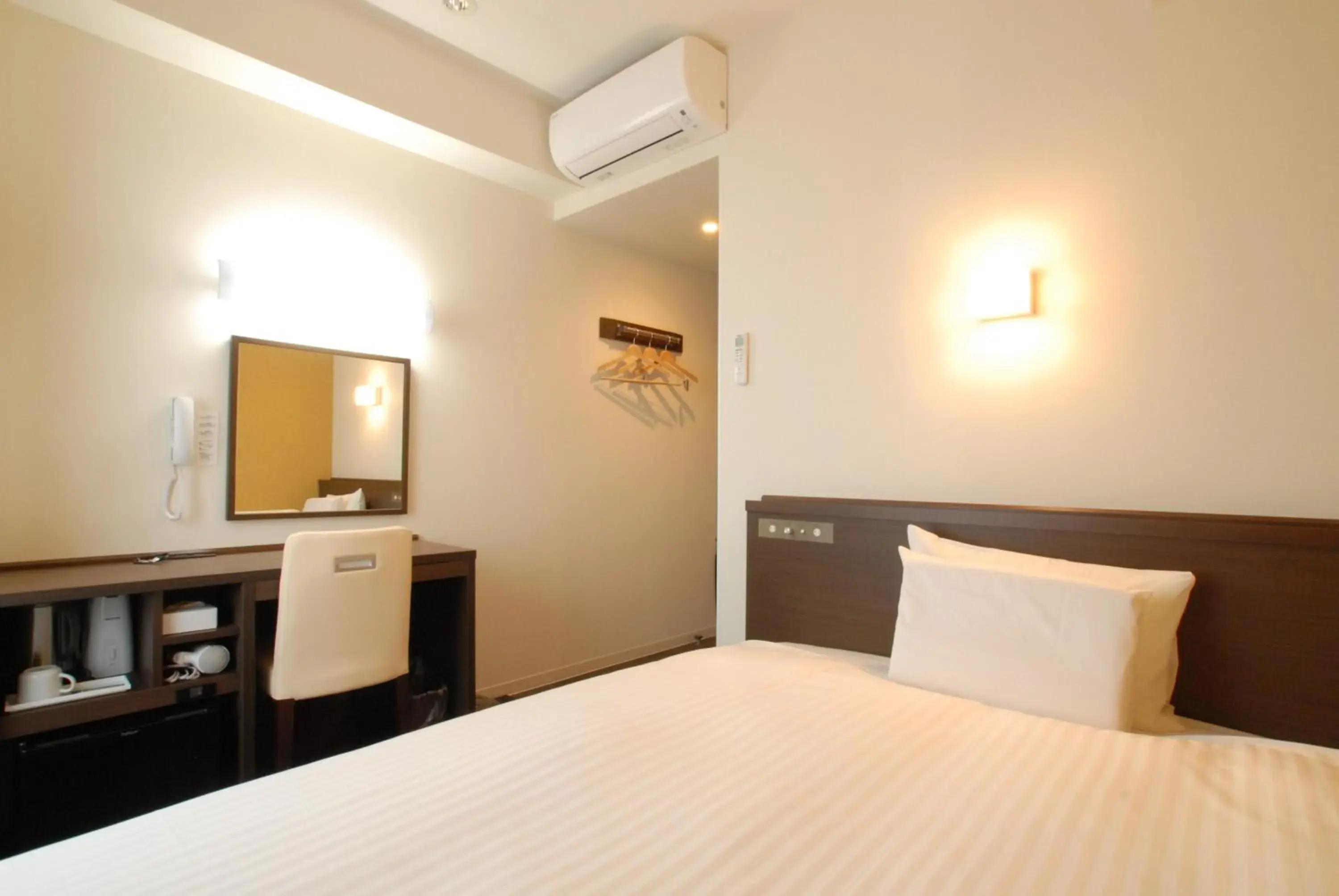 Bed in AB Hotel Isesaki Bed in AB Hotel Isesaki