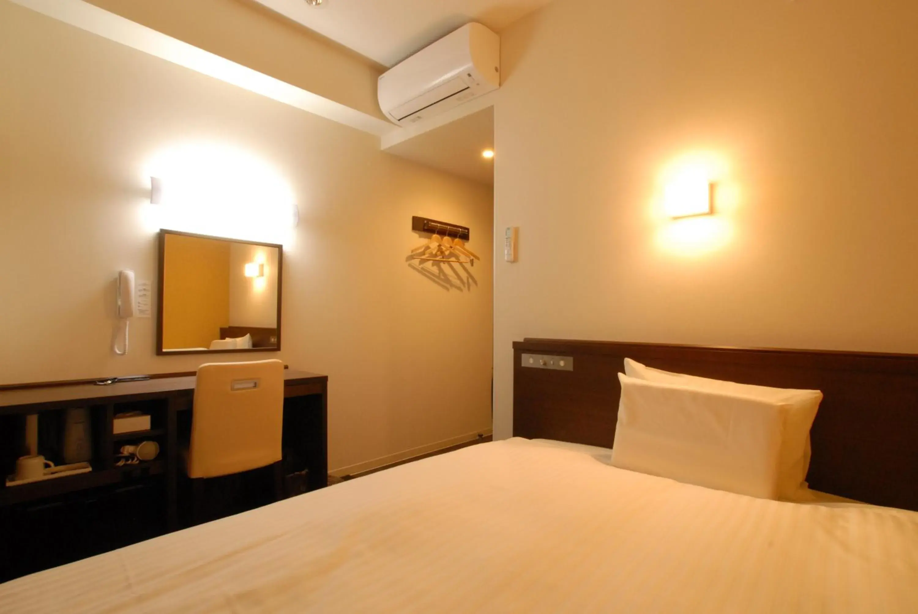 Bed in AB Hotel Isesaki Bed in AB Hotel Isesaki