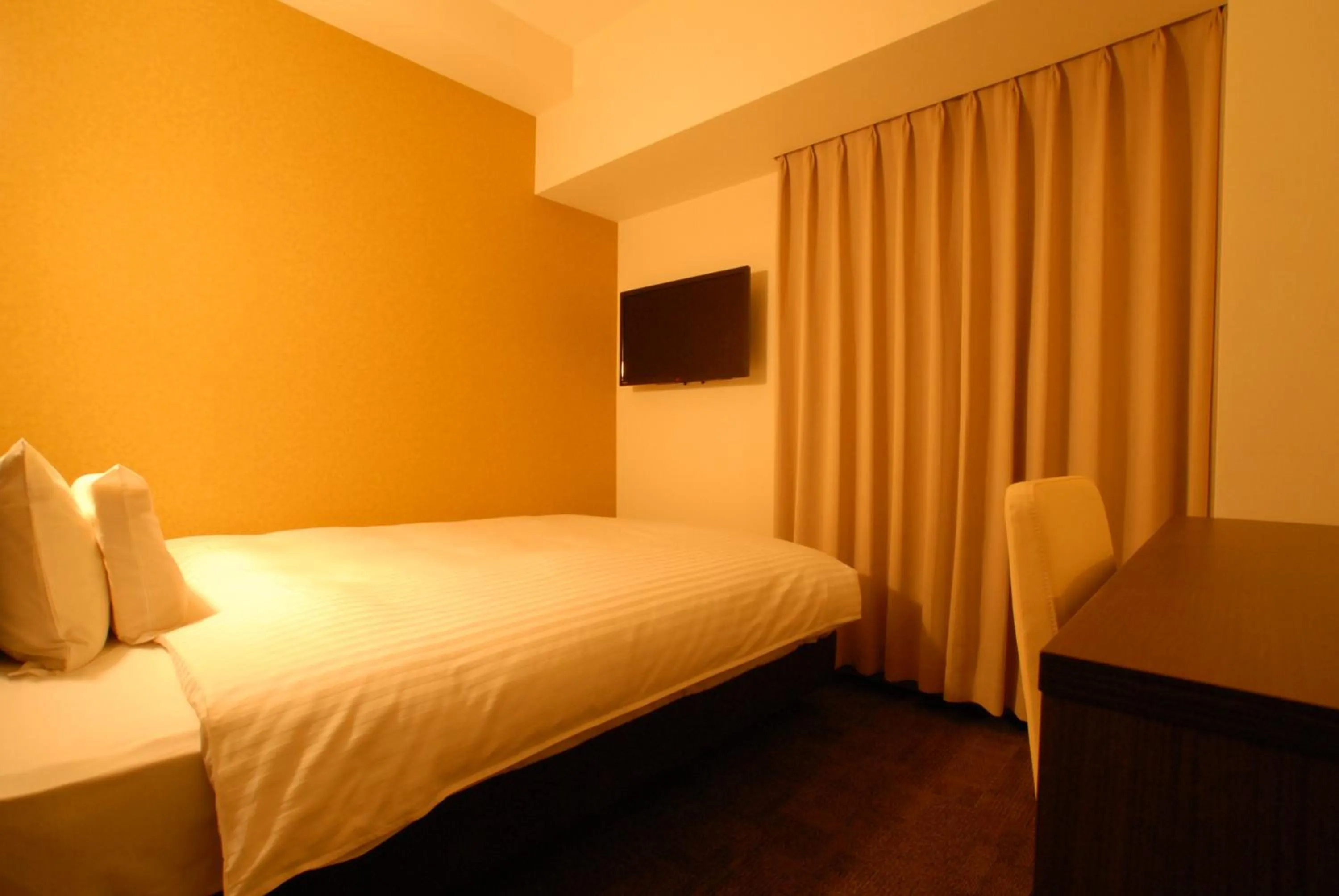 Bed in AB Hotel Isesaki