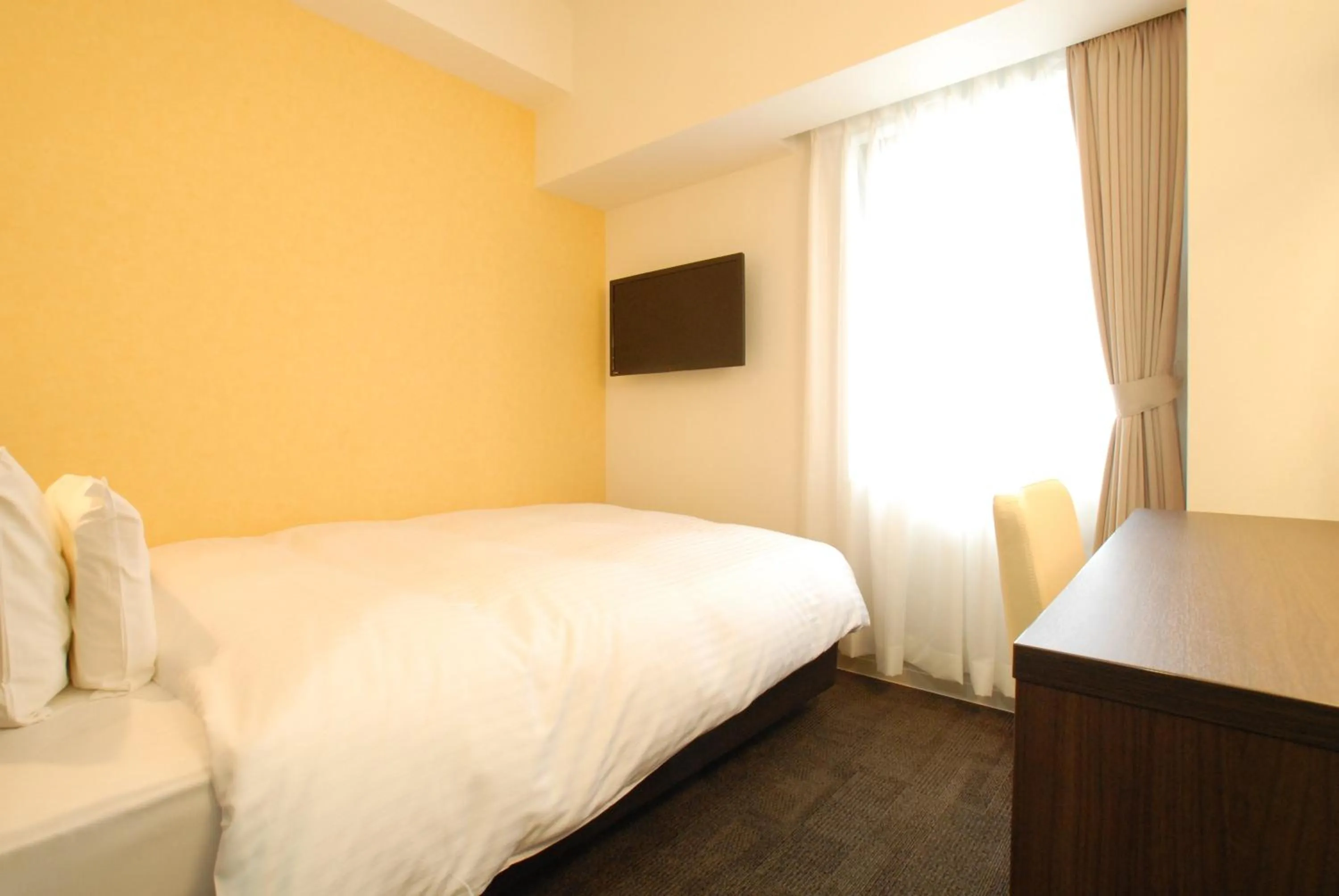 Bed in AB Hotel Mikawa Toyota