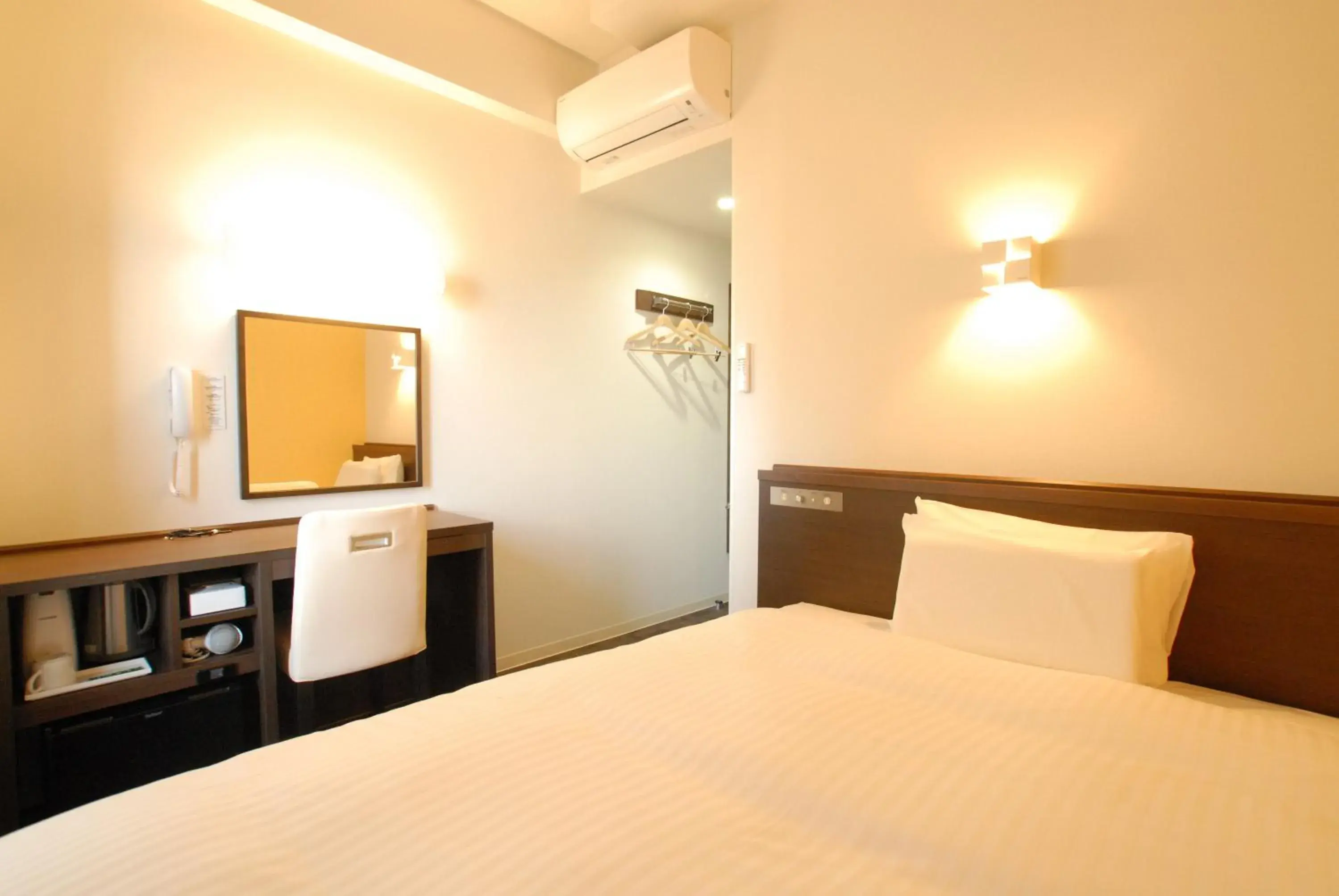 Bed in AB Hotel Mikawa Toyota Bed in AB Hotel Mikawa Toyota