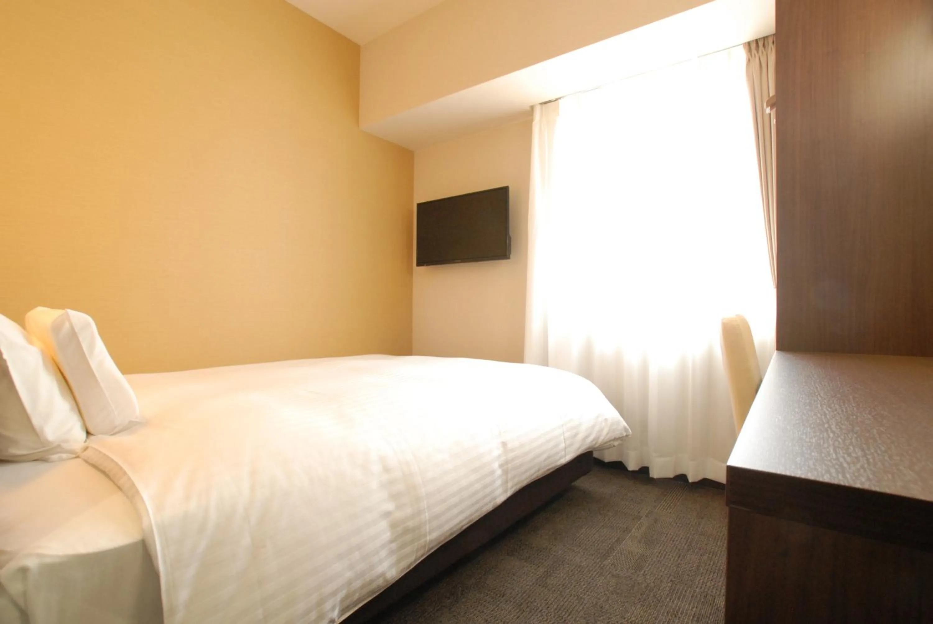 Bed in AB Hotel Gifu