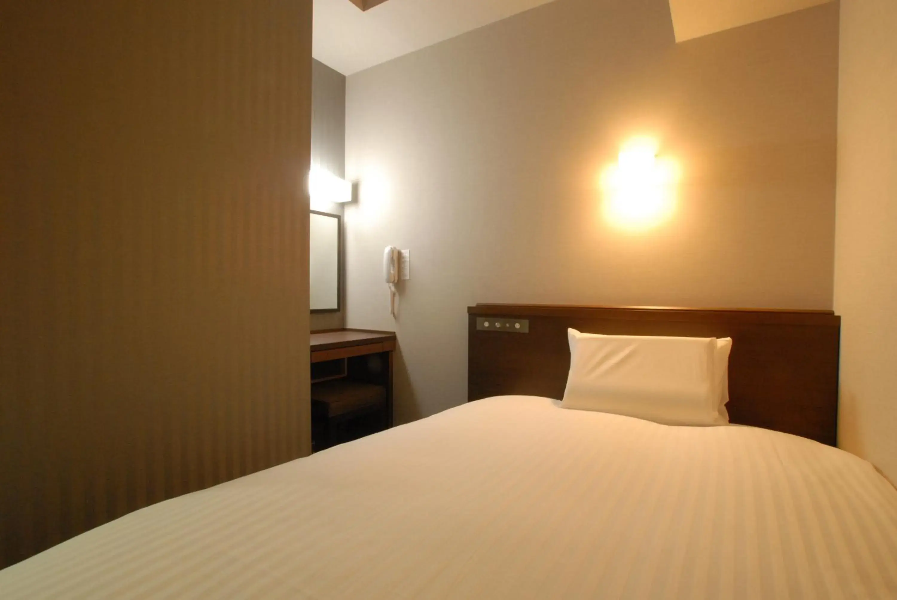 Bed in AB Hotel Gifu Bed in AB Hotel Gifu
