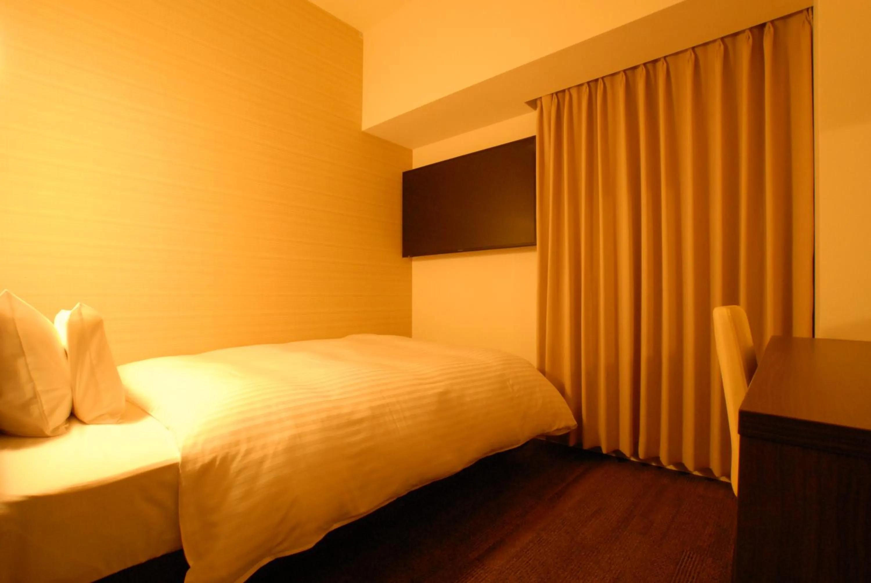 Bed in AB Hotel Iwata