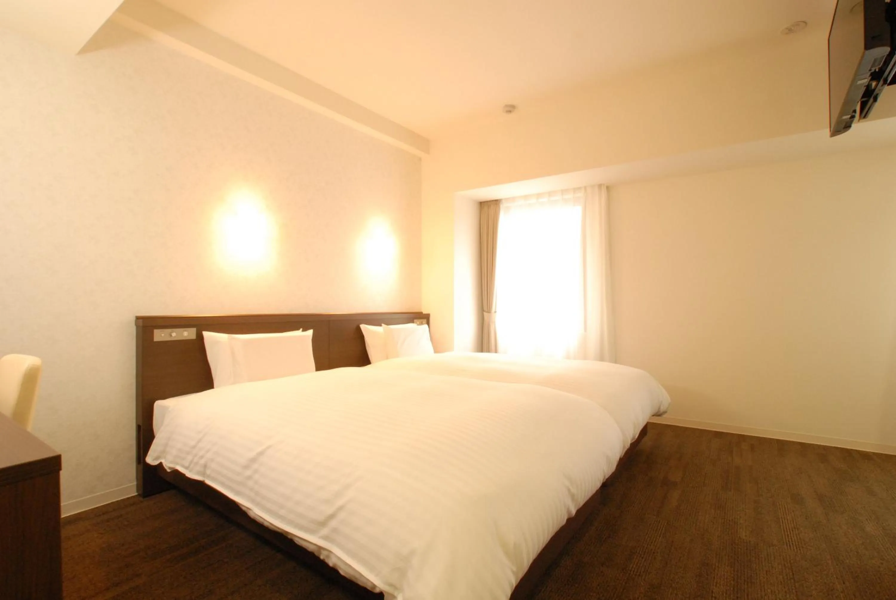 Bed in AB Hotel Iwata