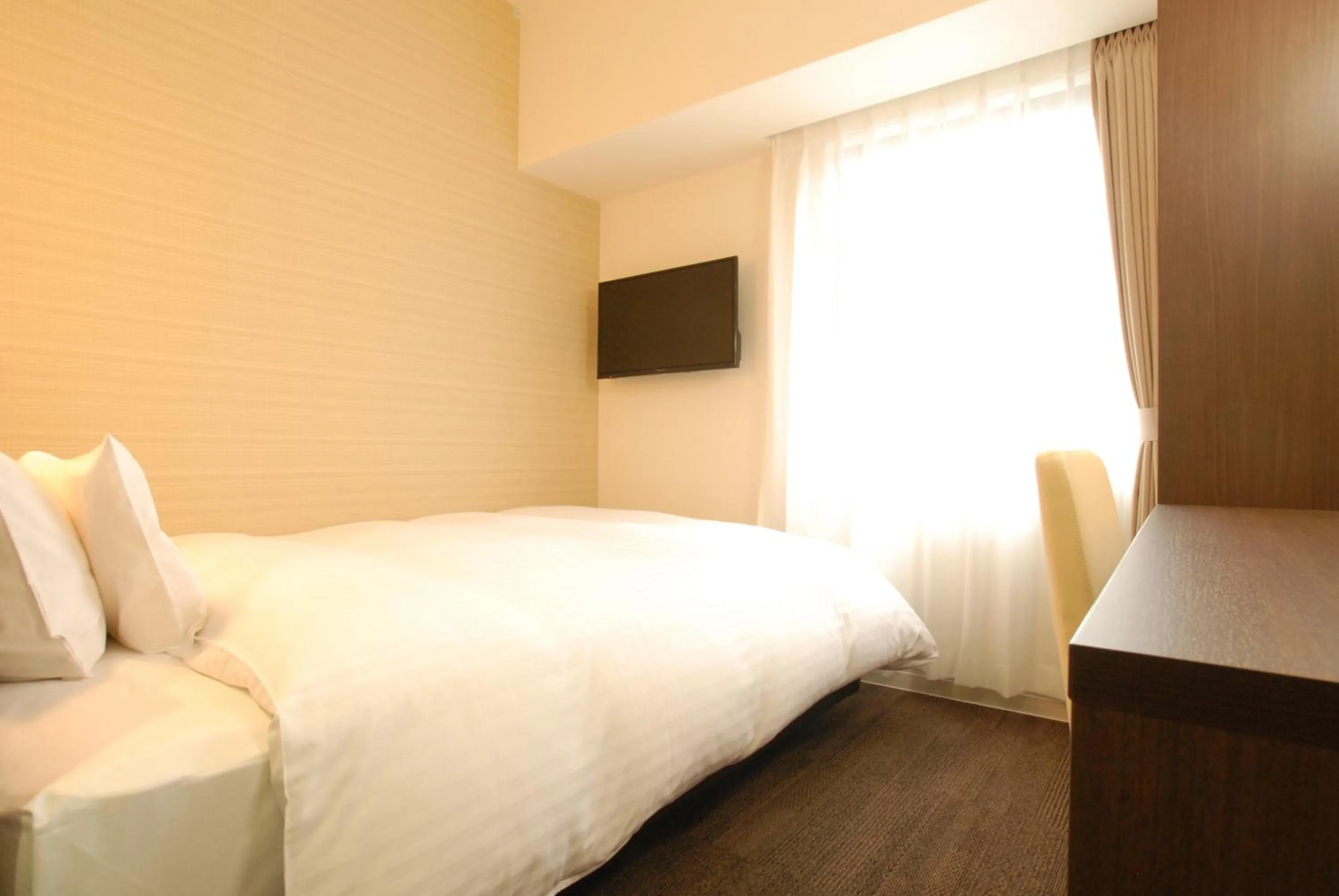 Bed in AB Hotel Iwata