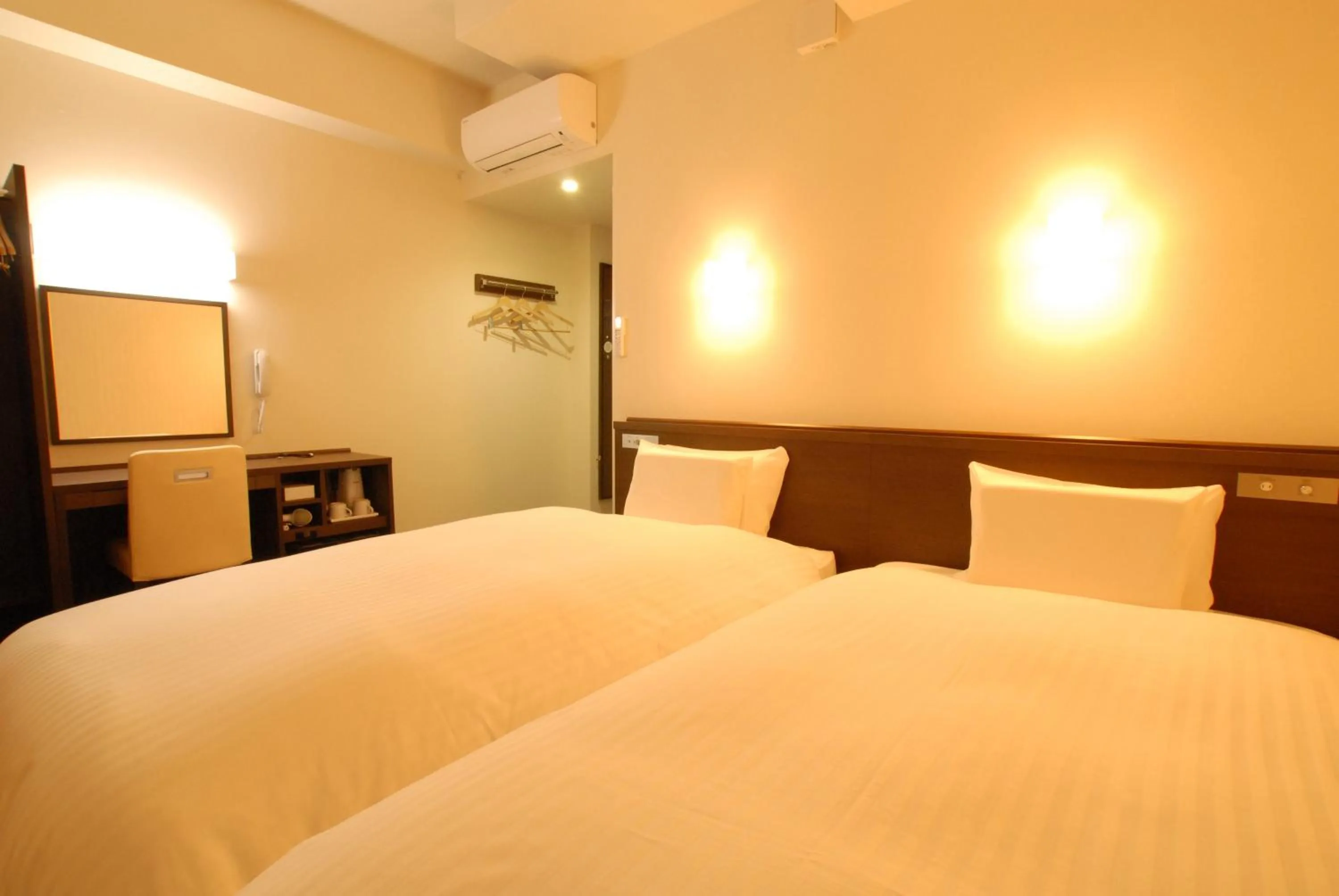 Bed in AB Hotel Iwata