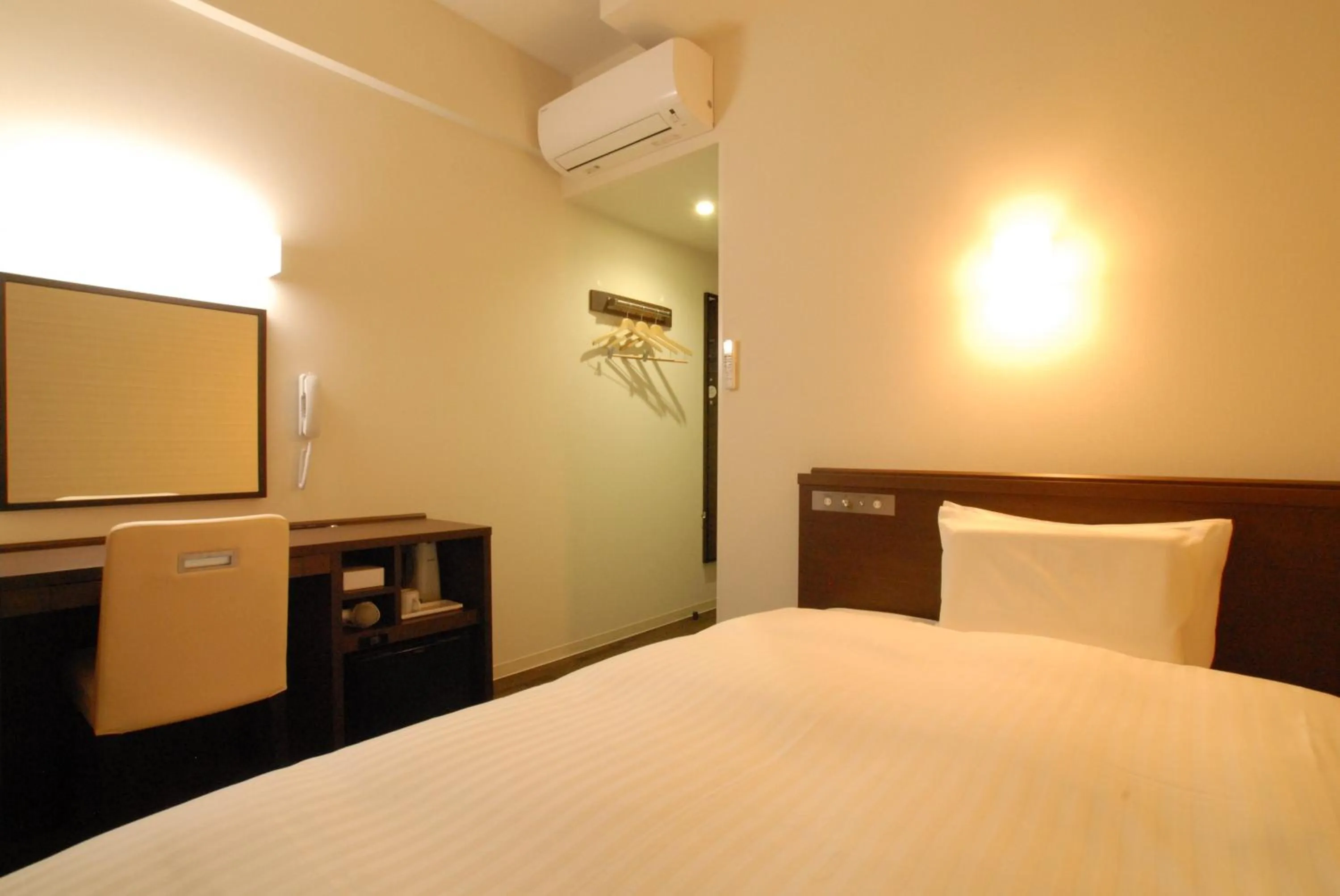 Bed in AB Hotel Iwata