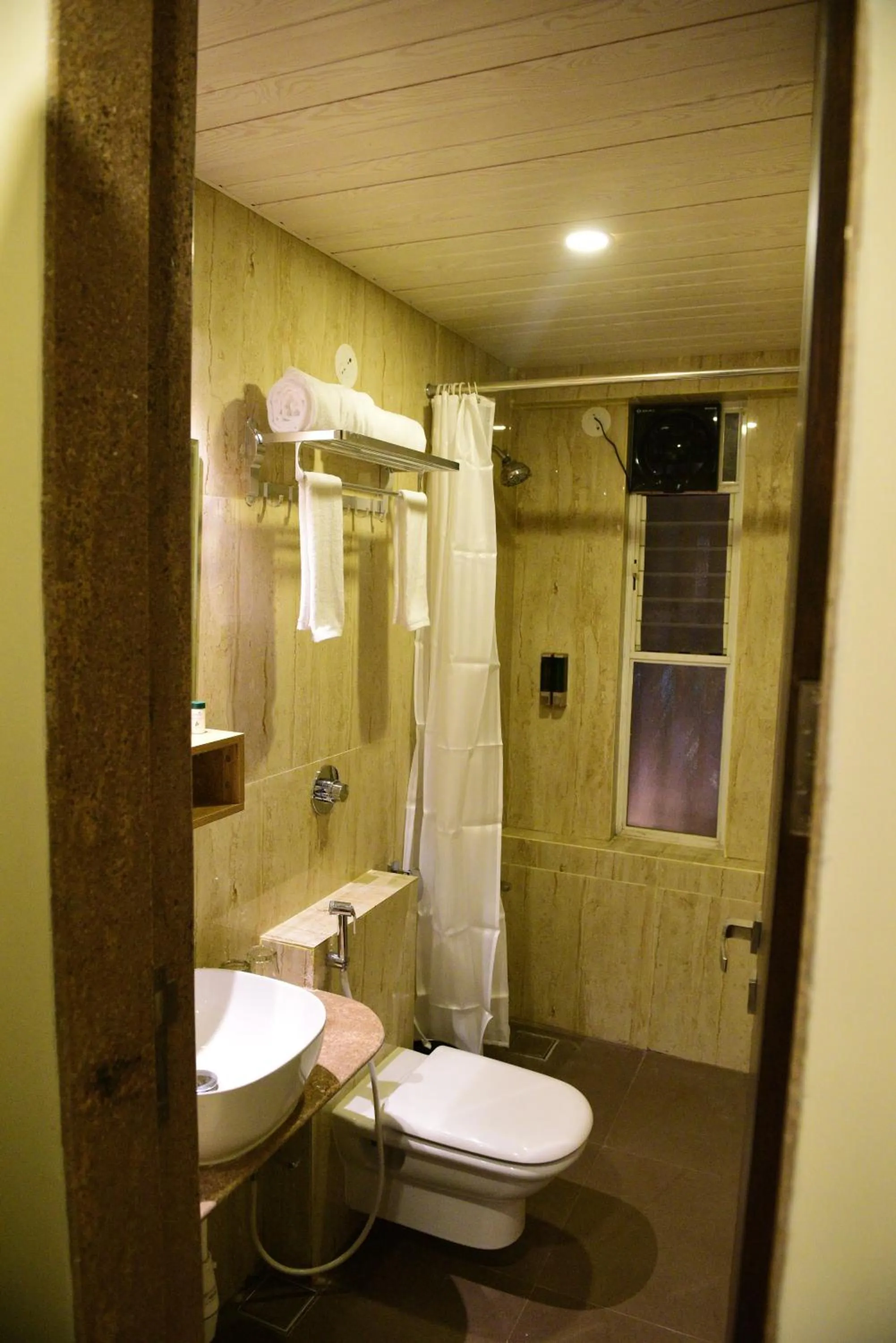 Bathroom in Little Mastiff Moshi by OTHPL