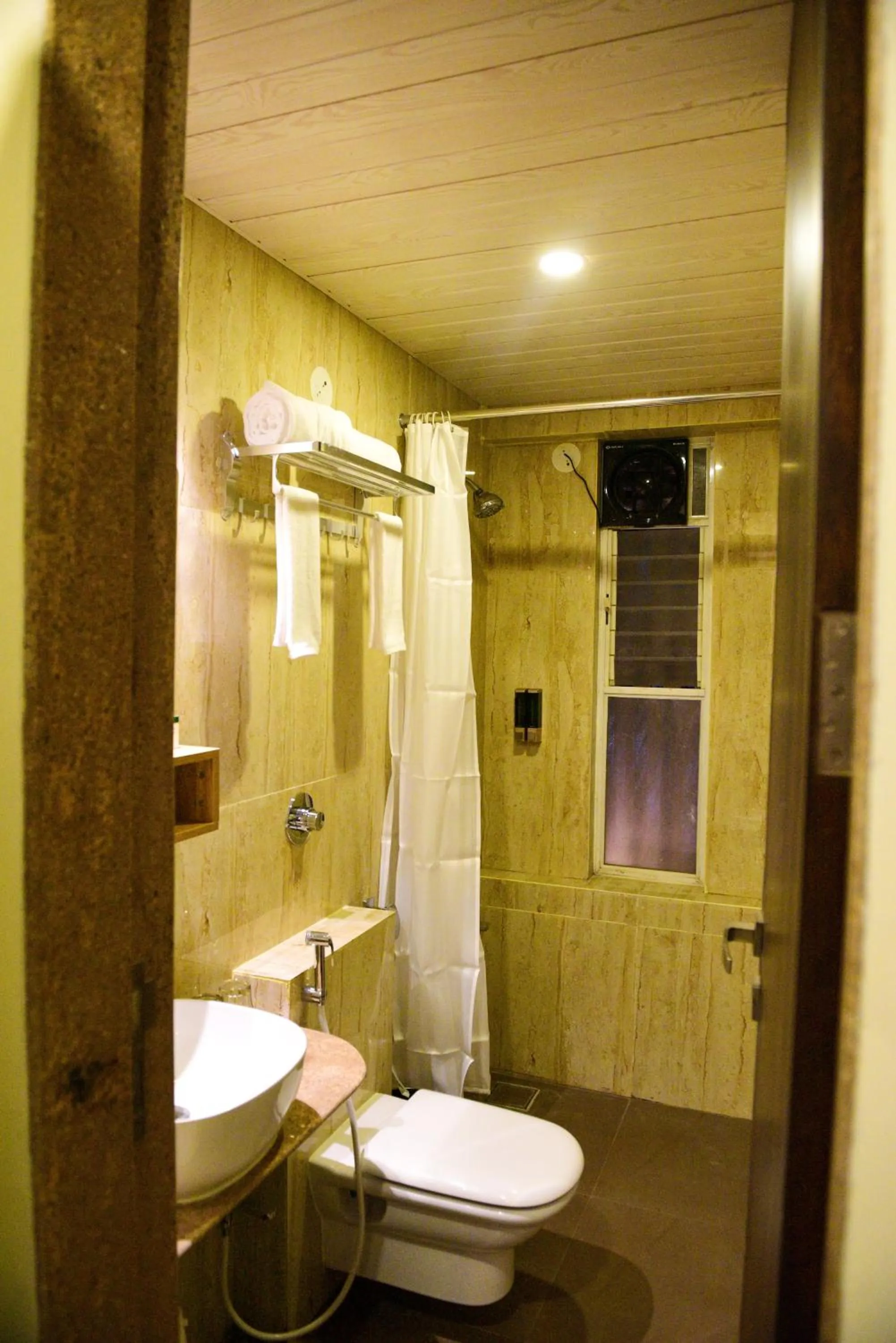 Bathroom in Little Mastiff Moshi by OTHPL