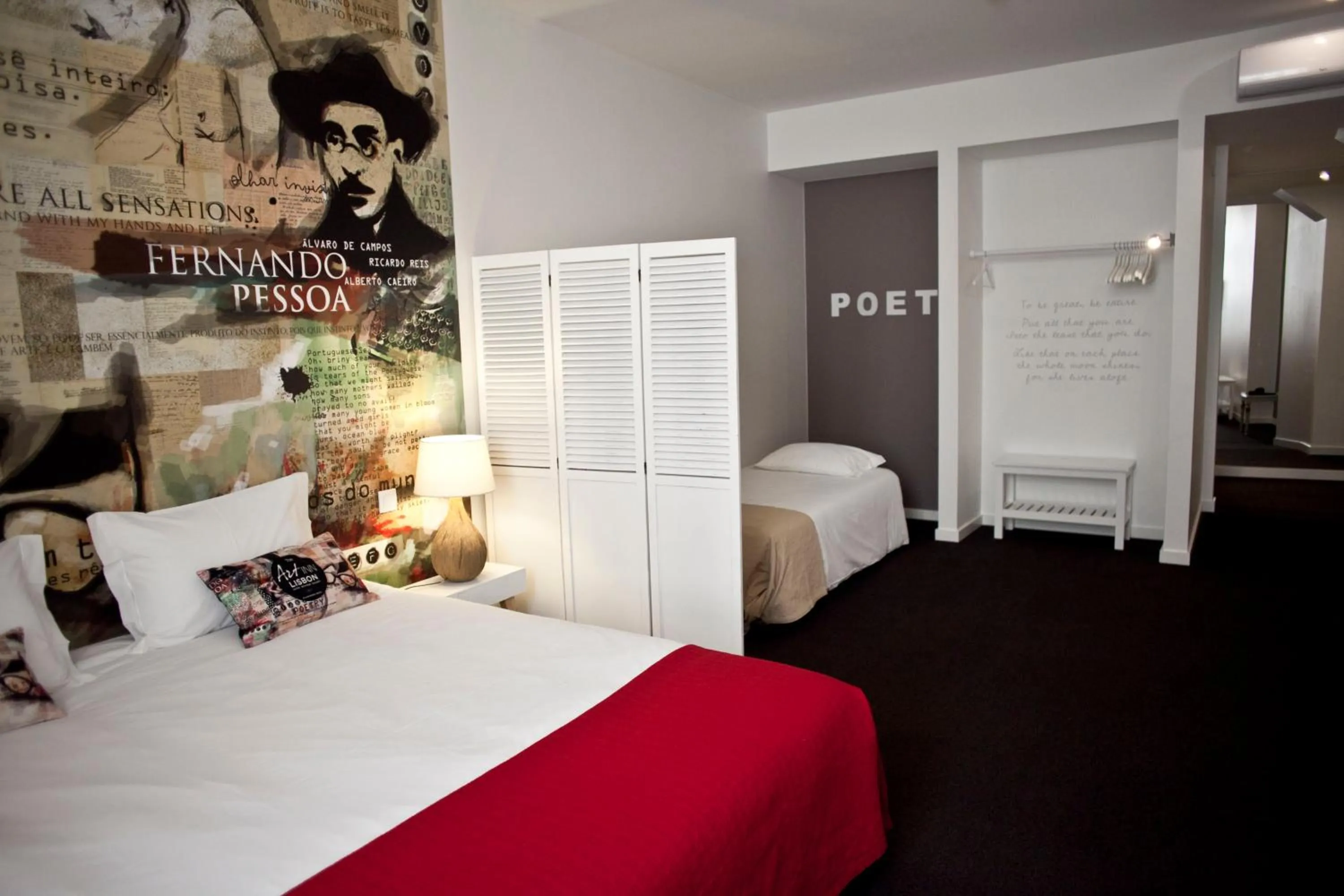 Bed in The ART INN Lisbon