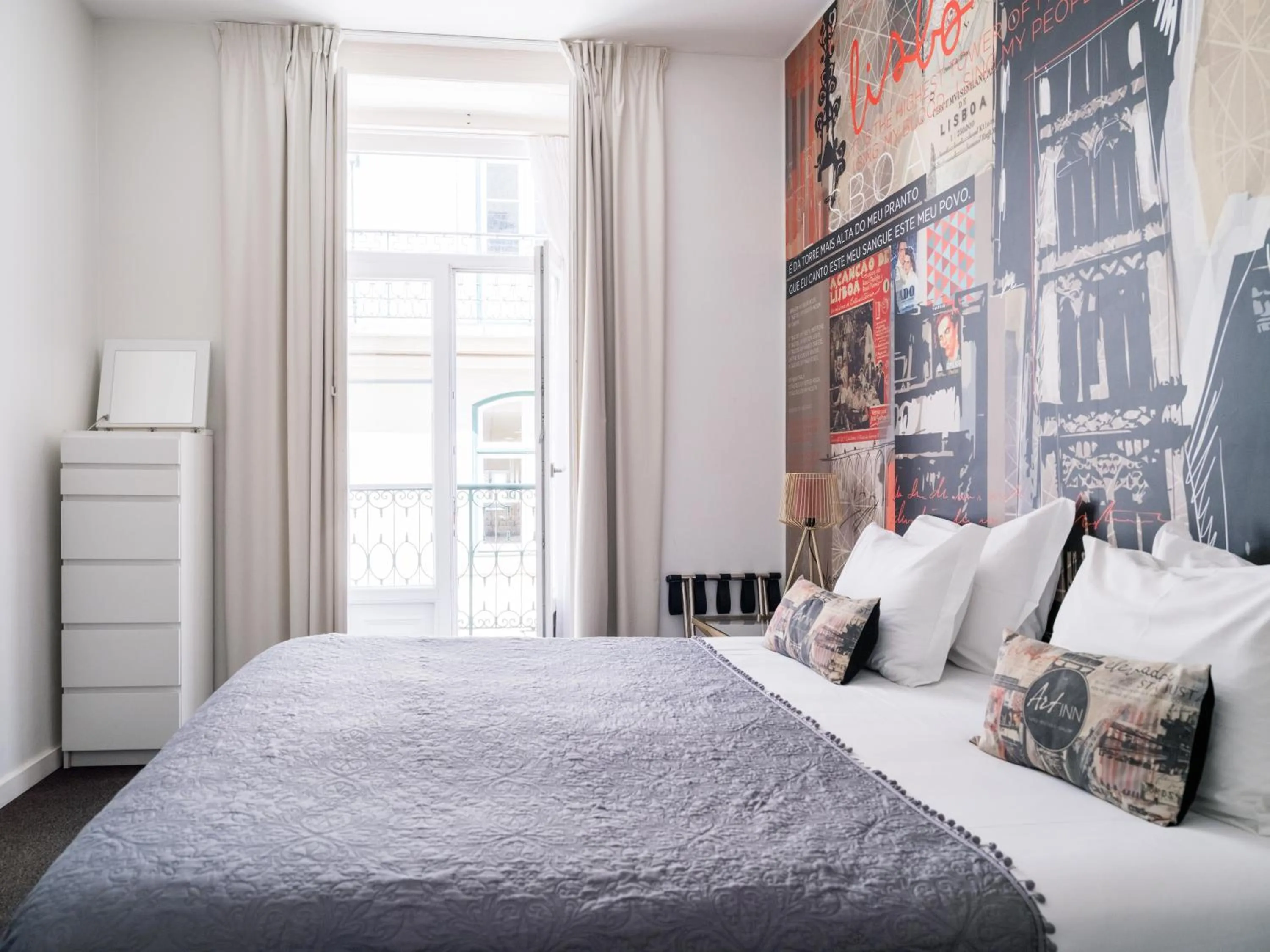 Bed in The ART INN Lisbon