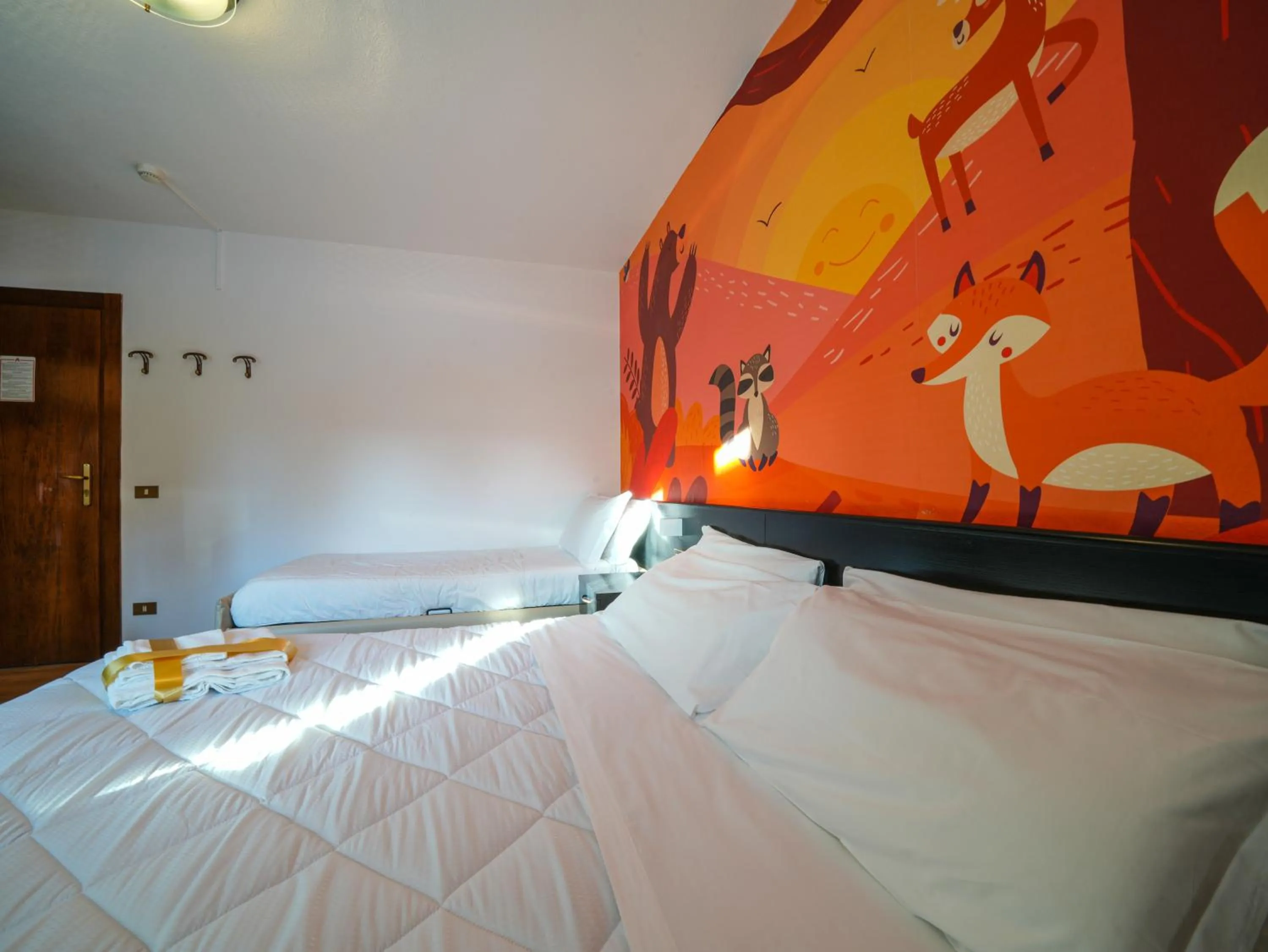 Bed in Hotel Arlecchino - Dada Hotels