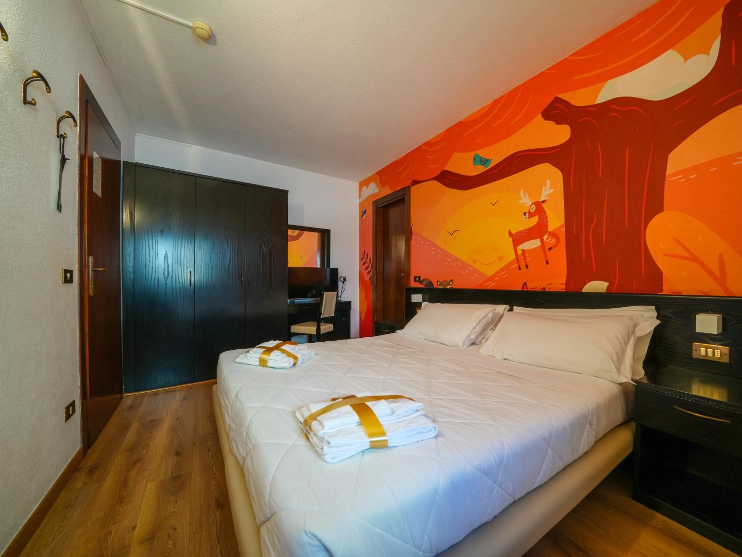 Bed in Hotel Arlecchino - Dada Hotels