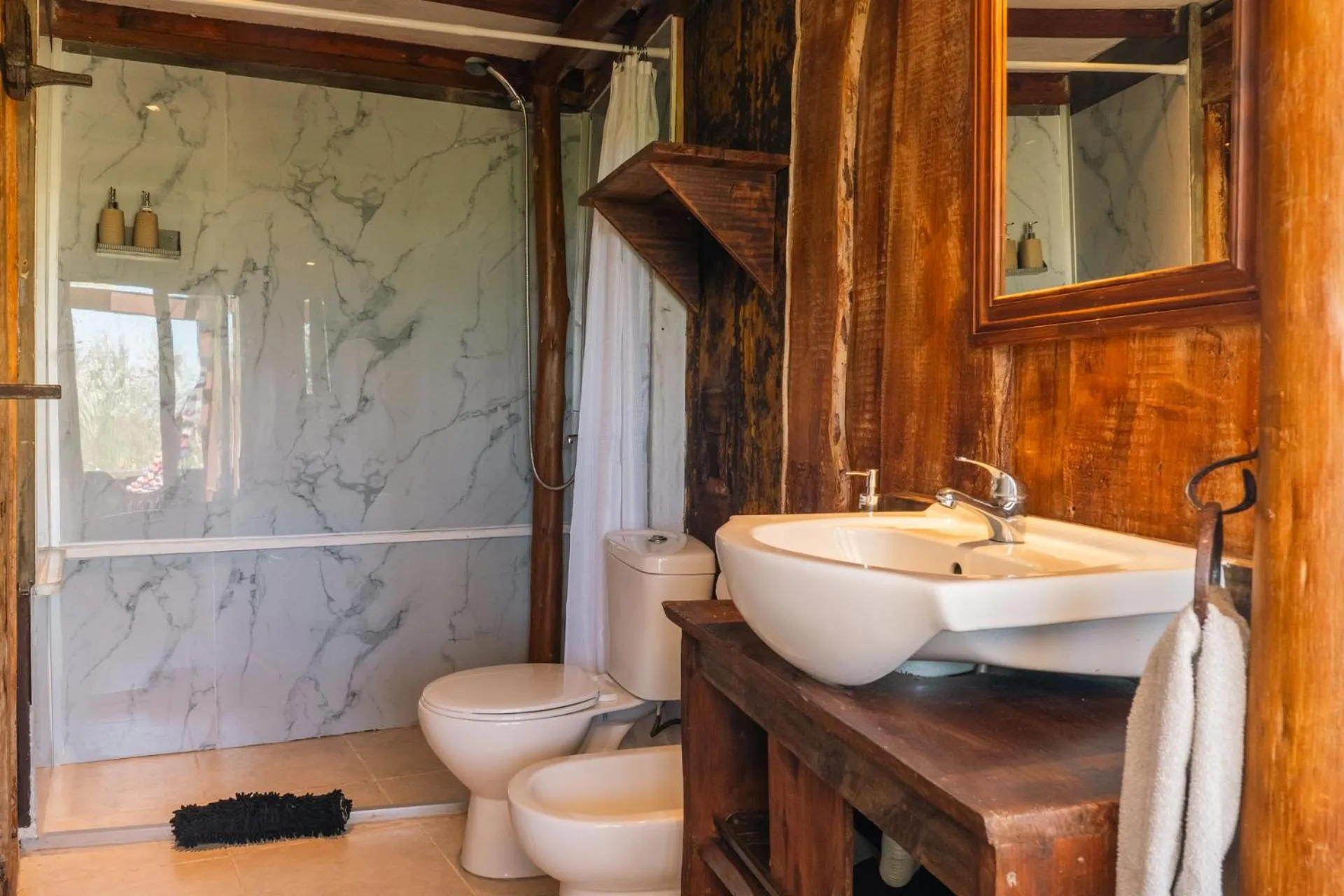Bathroom in Cabañas en el Bosque a 5 minutos del mar - Estancia CH