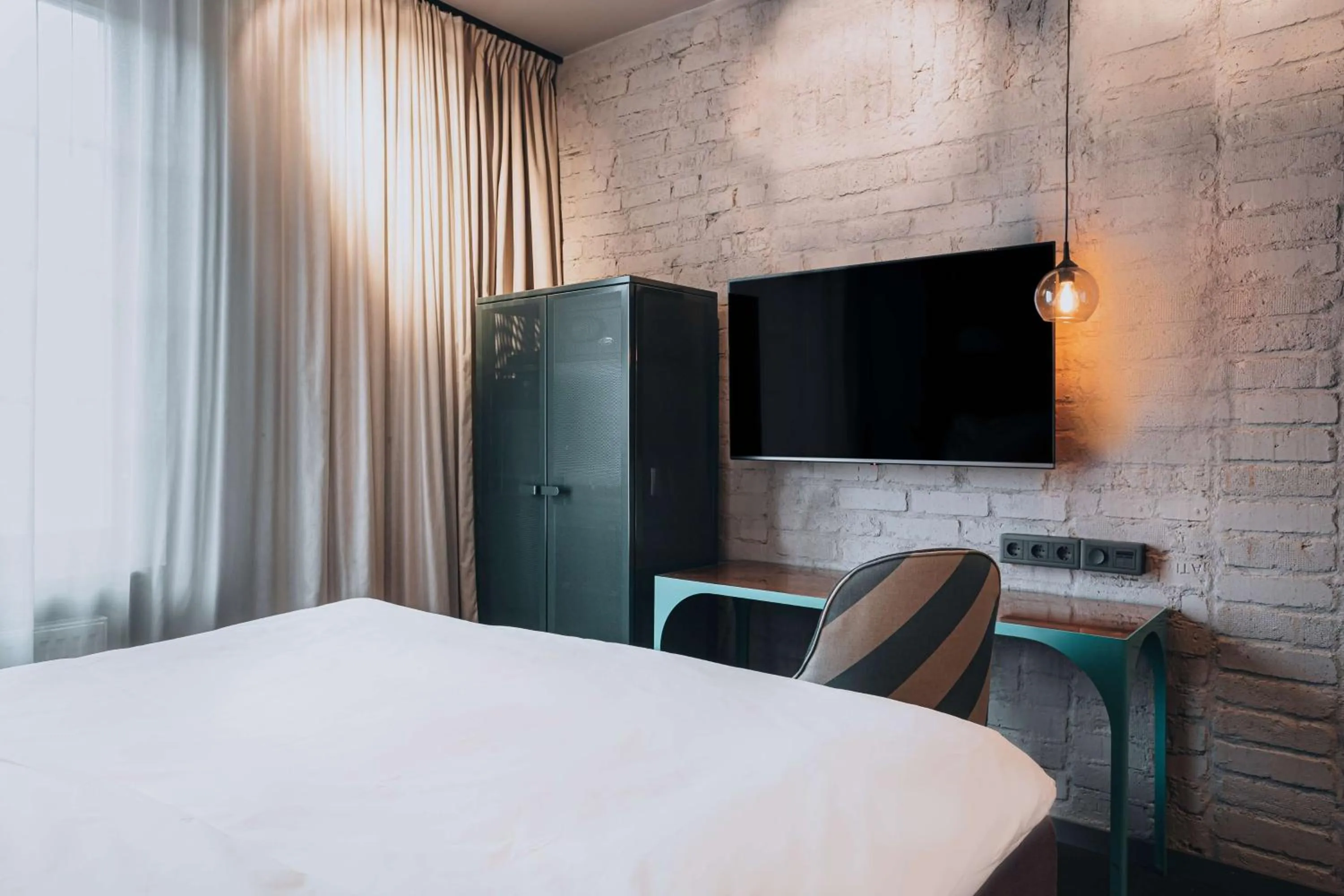 TV and multimedia, Bed in Story Hotel Signalfabriken, part of JdV by Hyatt