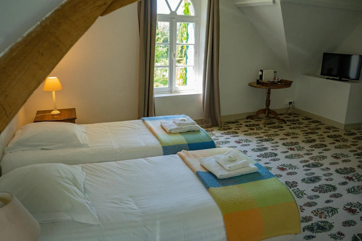 Bed in Hotel Haras De La Potardiere