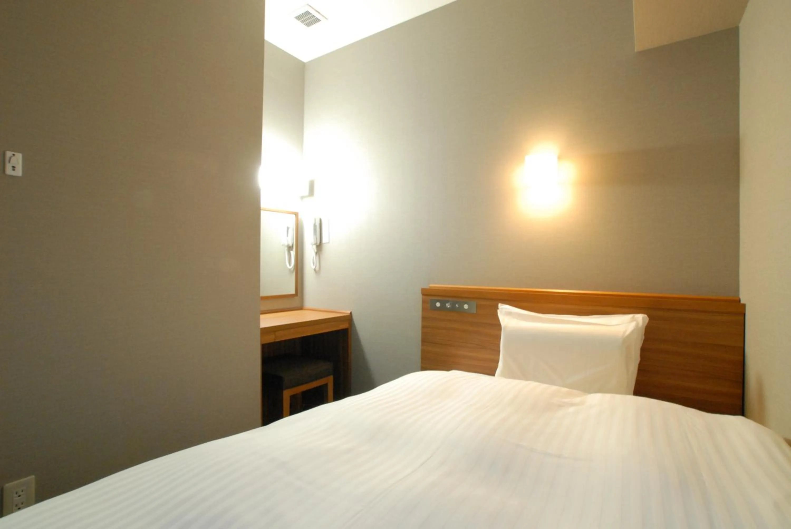 Bed in AB Hotel Fuji