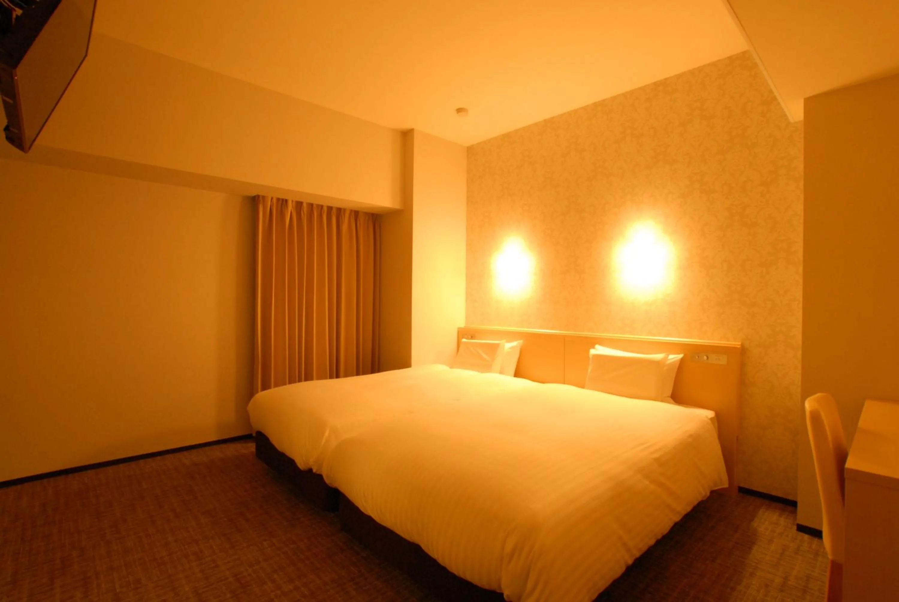 Bed in AB Hotel Fuji