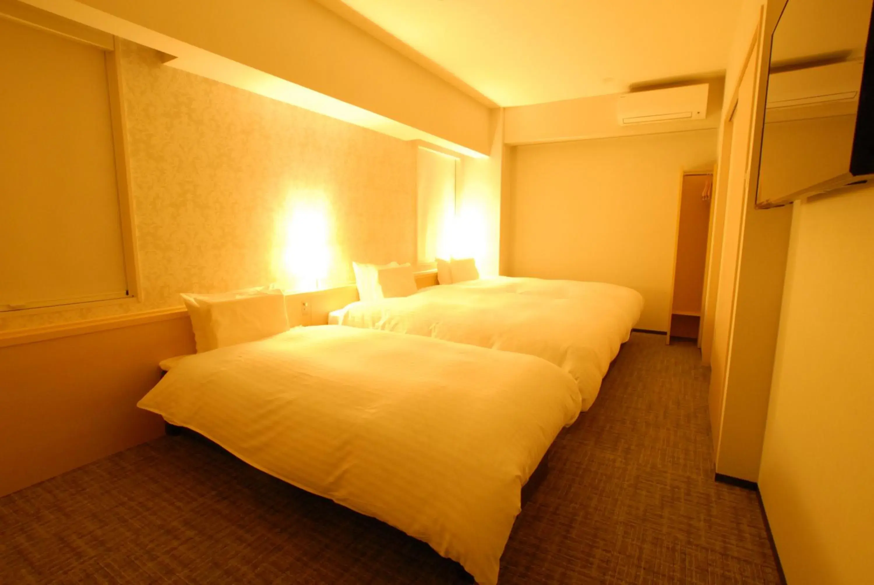 Bed in AB Hotel Fuji Bed in AB Hotel Fuji