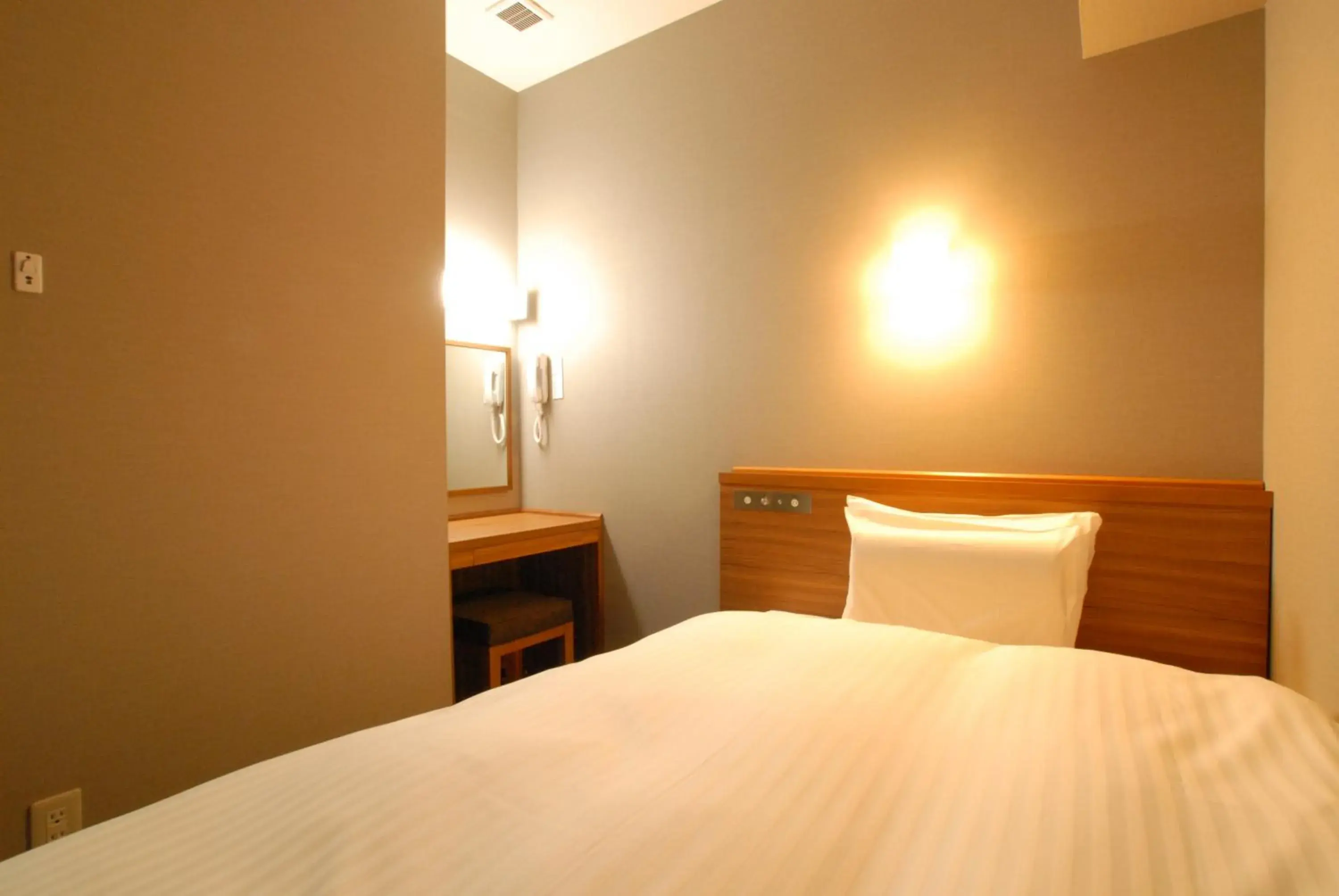 Bed in AB Hotel Fuji Bed in AB Hotel Fuji