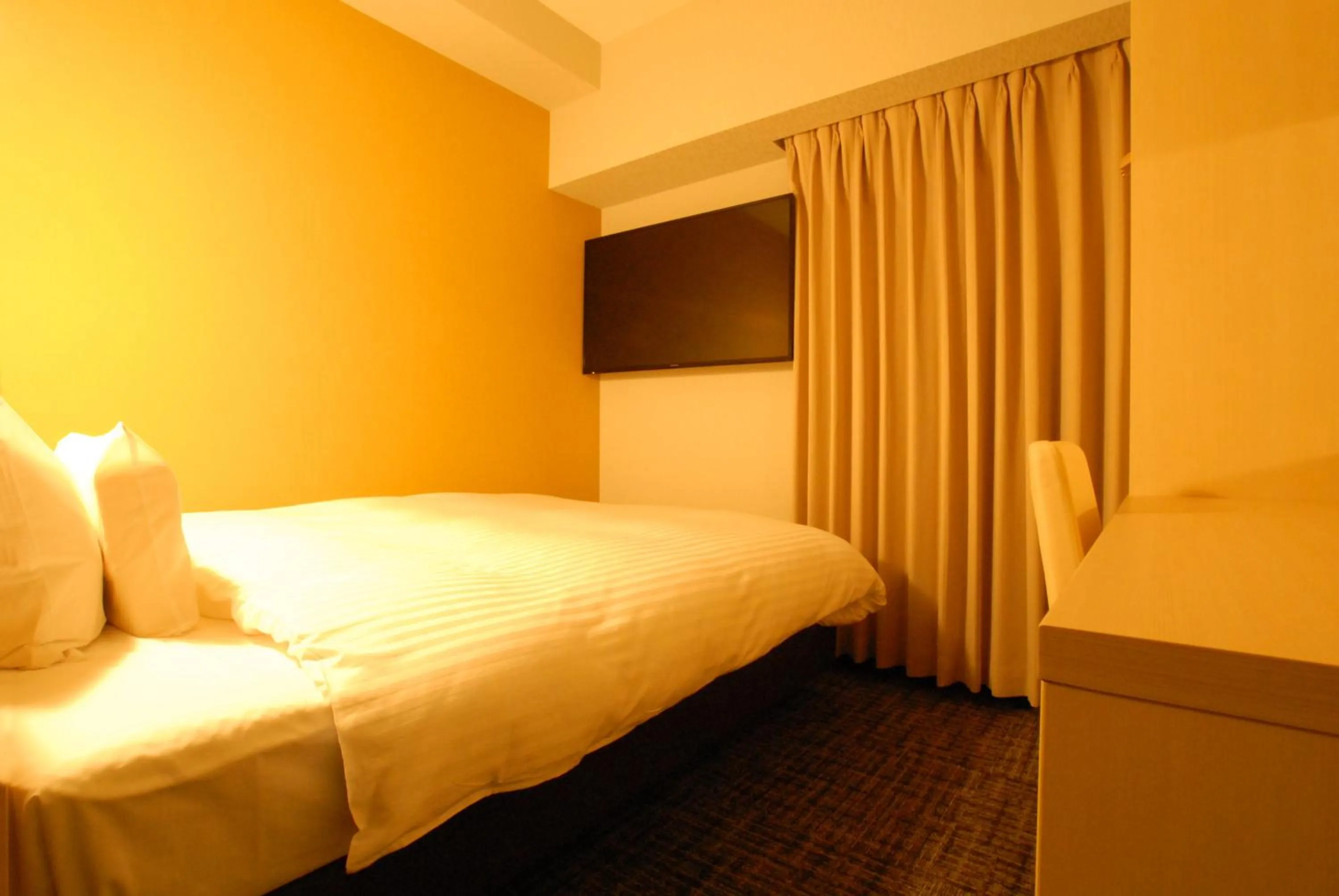 Bed in AB Hotel Fuji