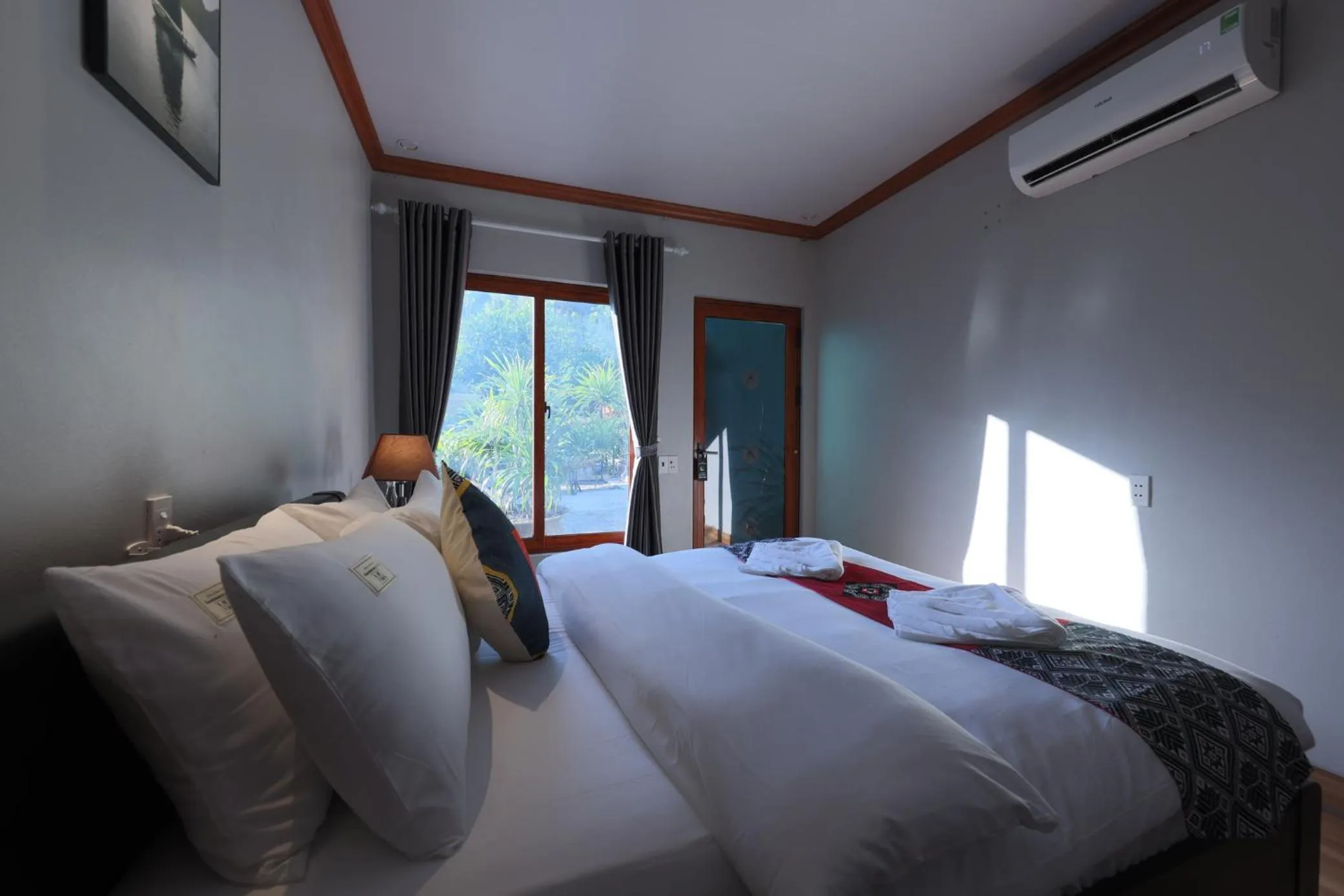 Bed in Cat Ba Serena Homestay And Swimming Pool
