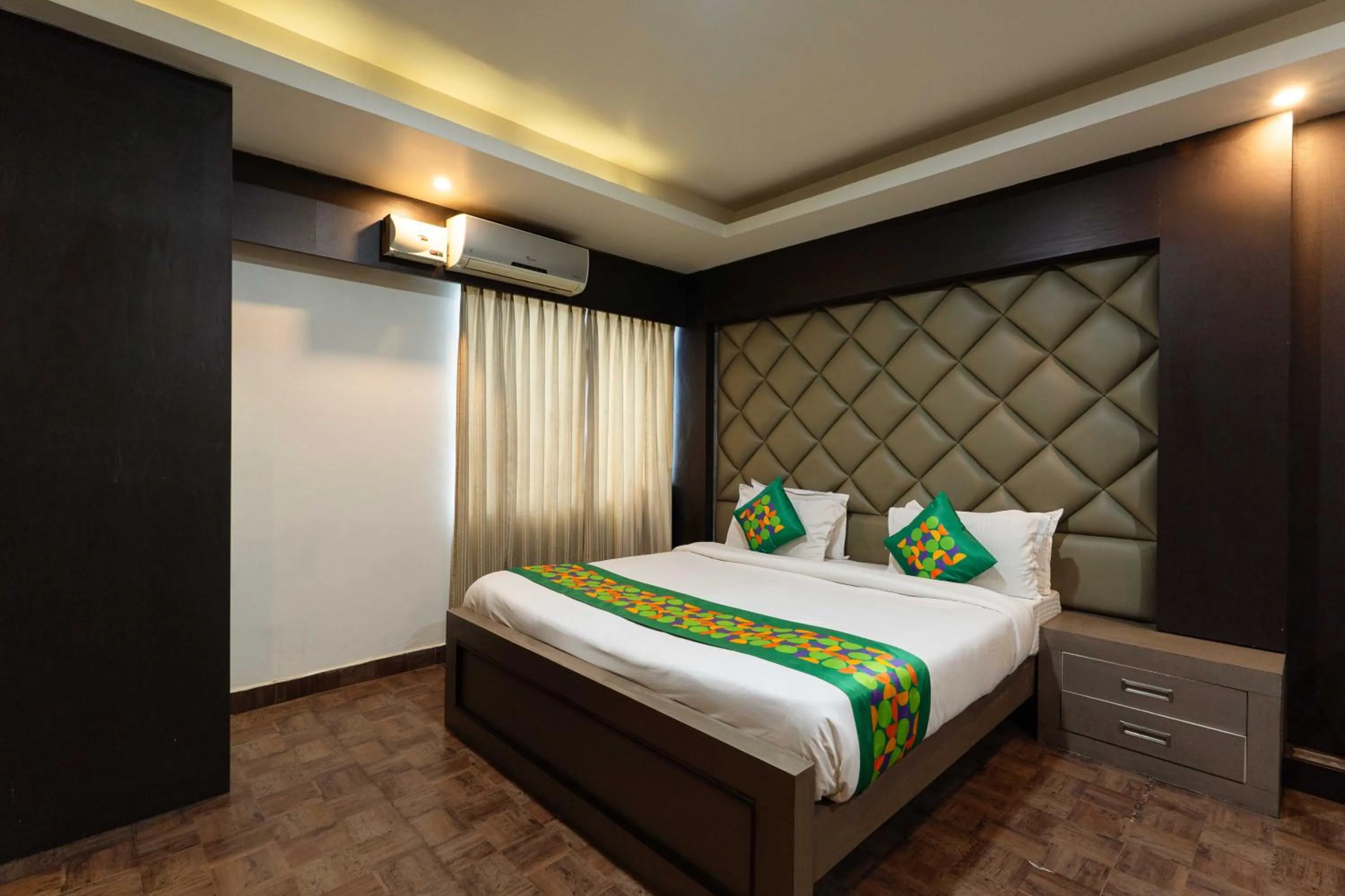 Bedroom, Bed in Treebo Kings Orchid