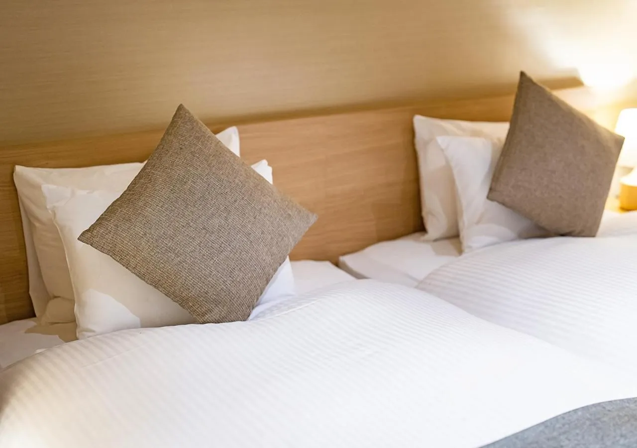 Bed in Stay SAKURA Tokyo Asakusa Yokozuna Hotel