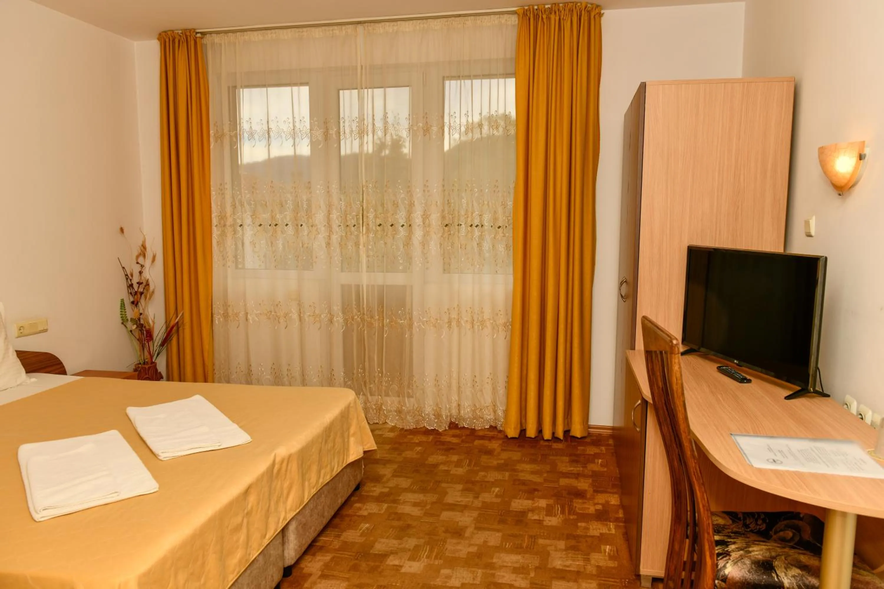 Bed in Blyan Family Hotel