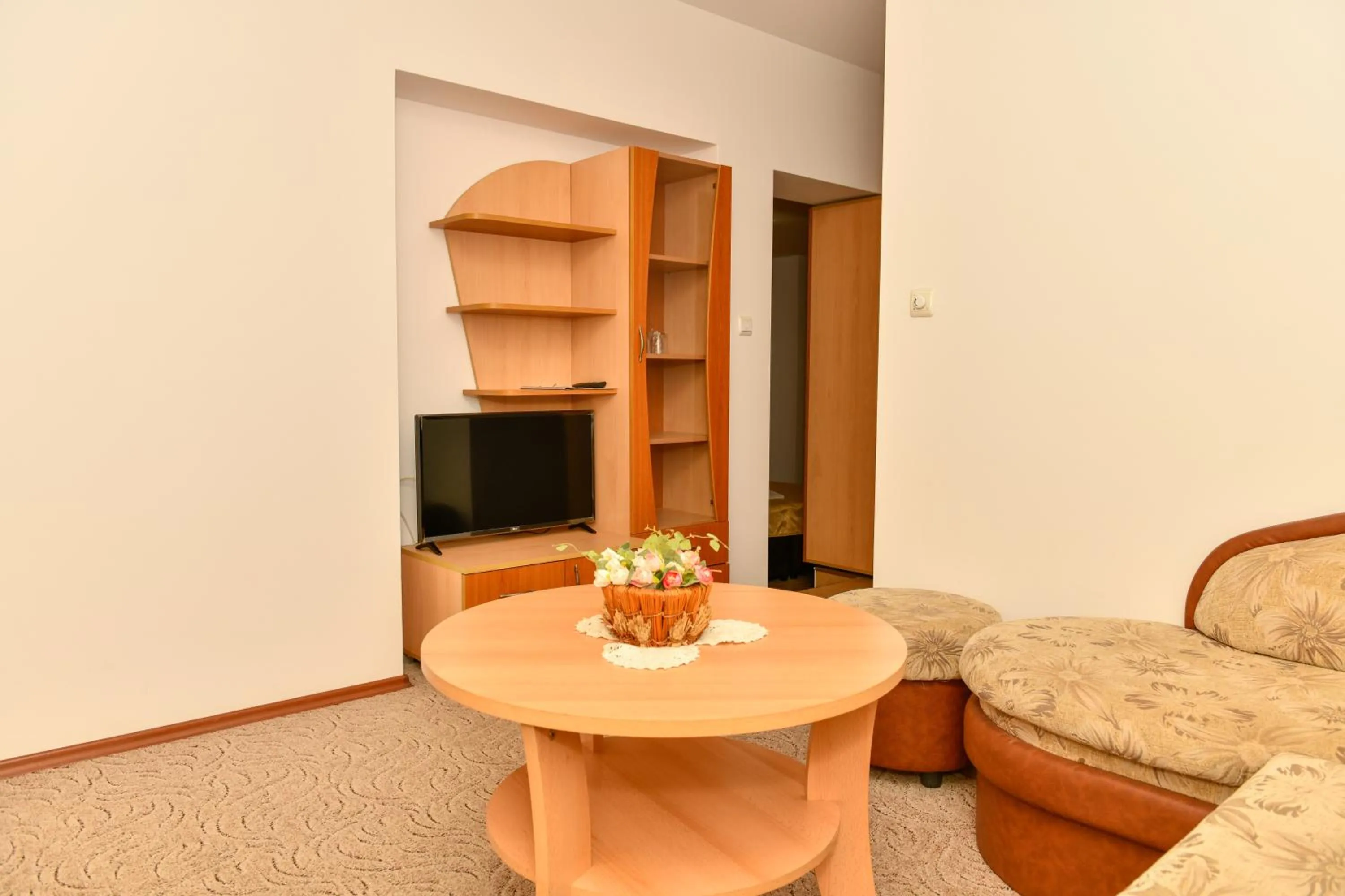 Communal lounge/ TV room in Blyan Family Hotel