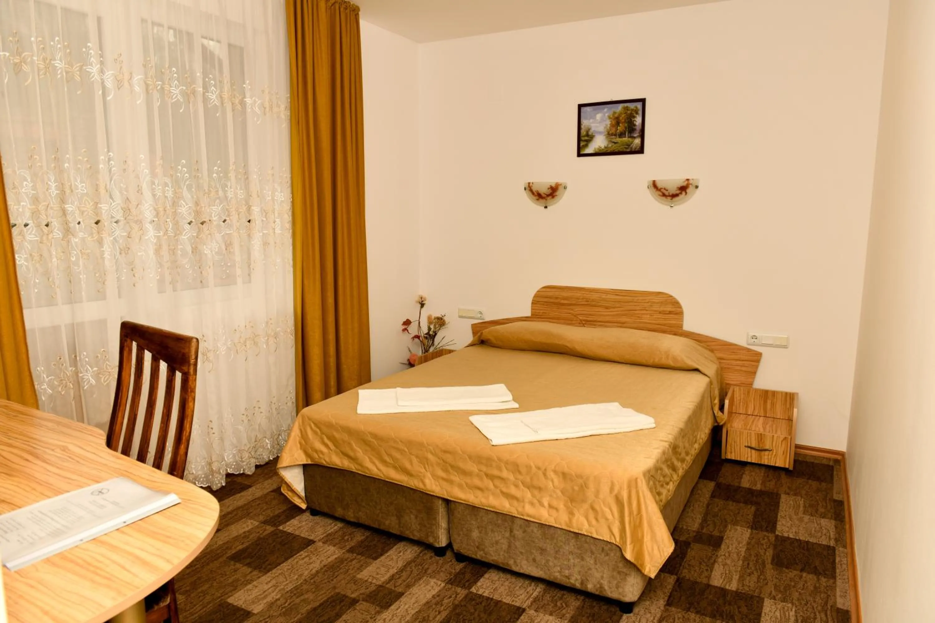 Bed in Blyan Family Hotel