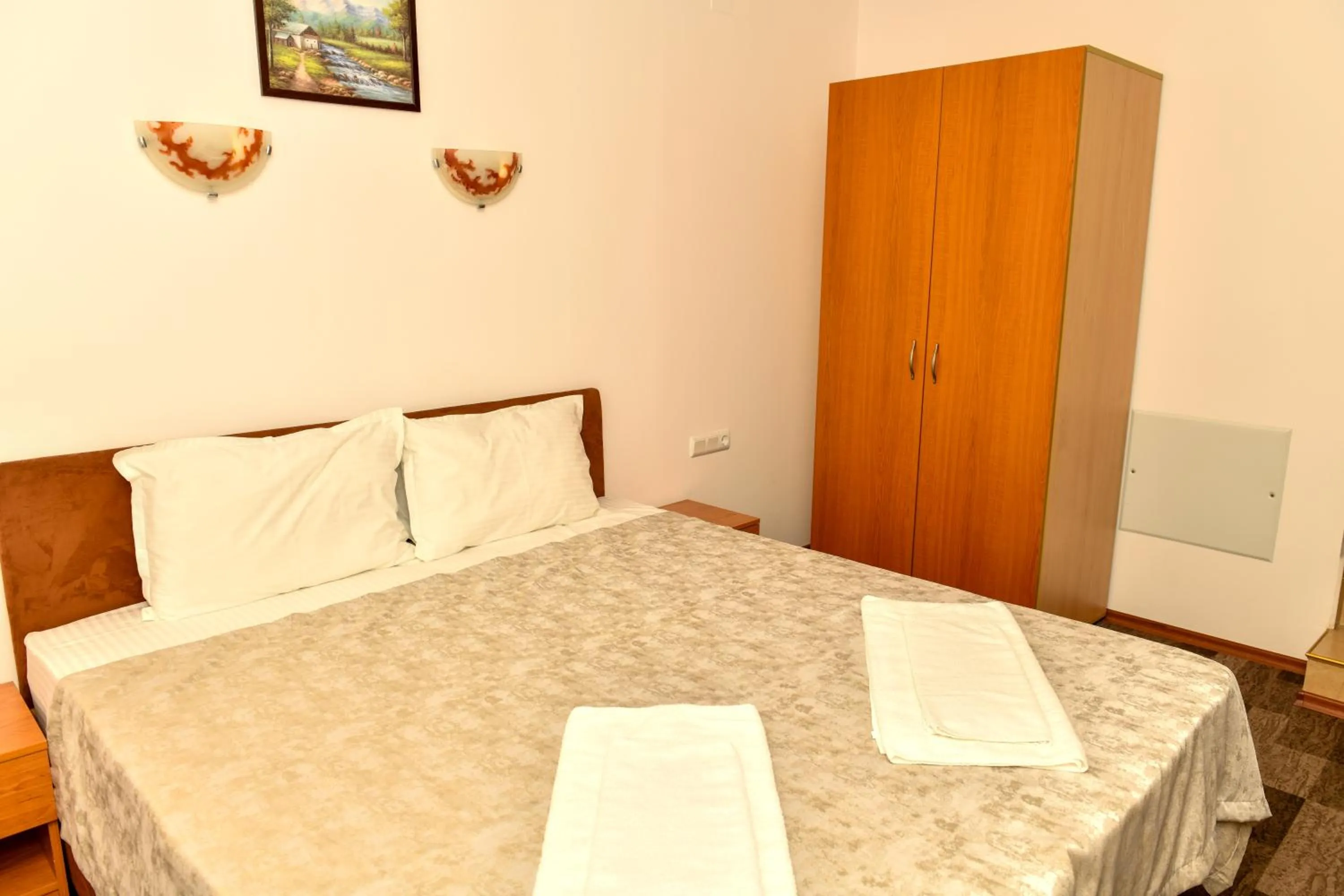 Bed in Blyan Family Hotel