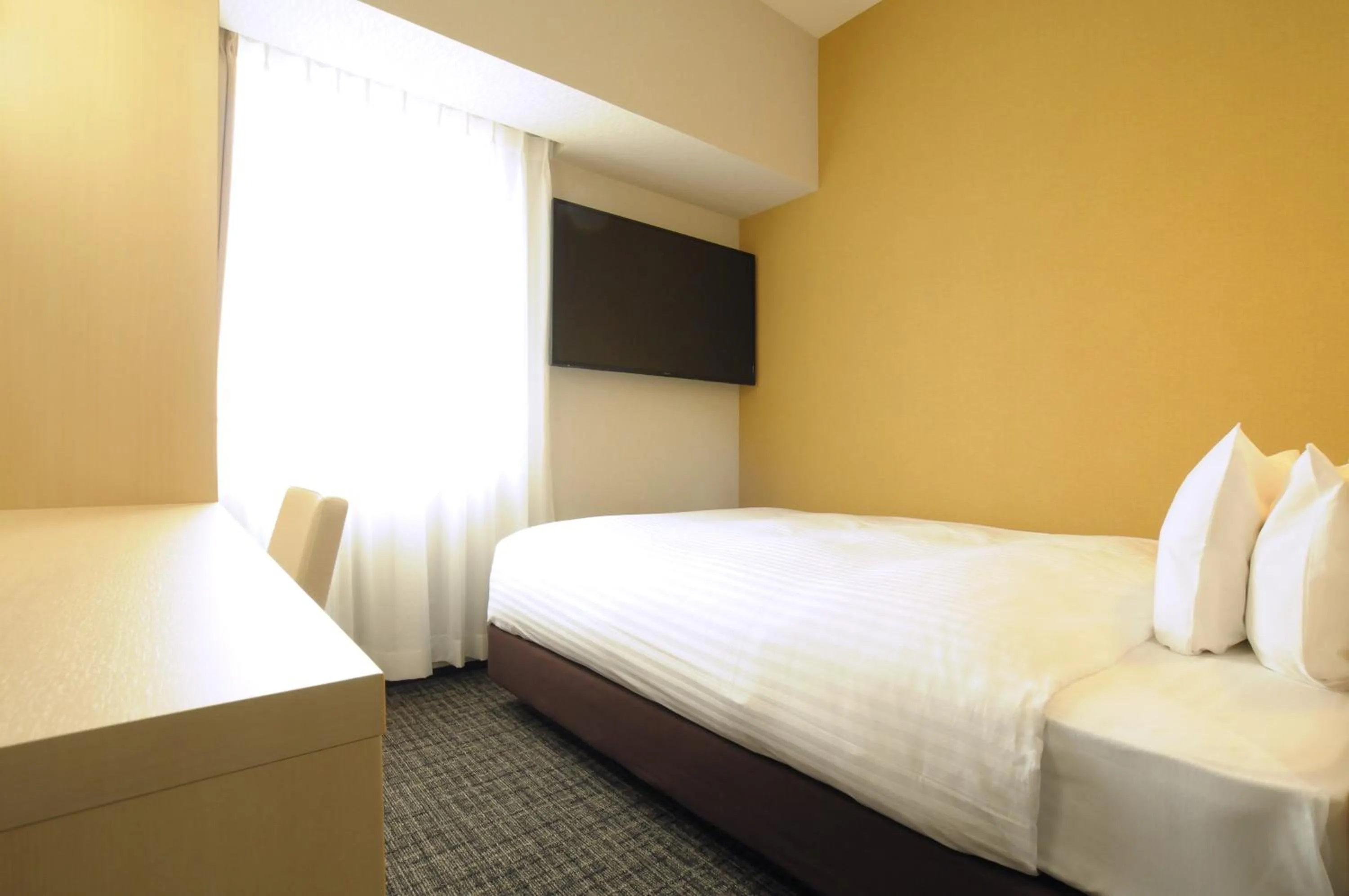 Bed in AB Hotel Omihachiman