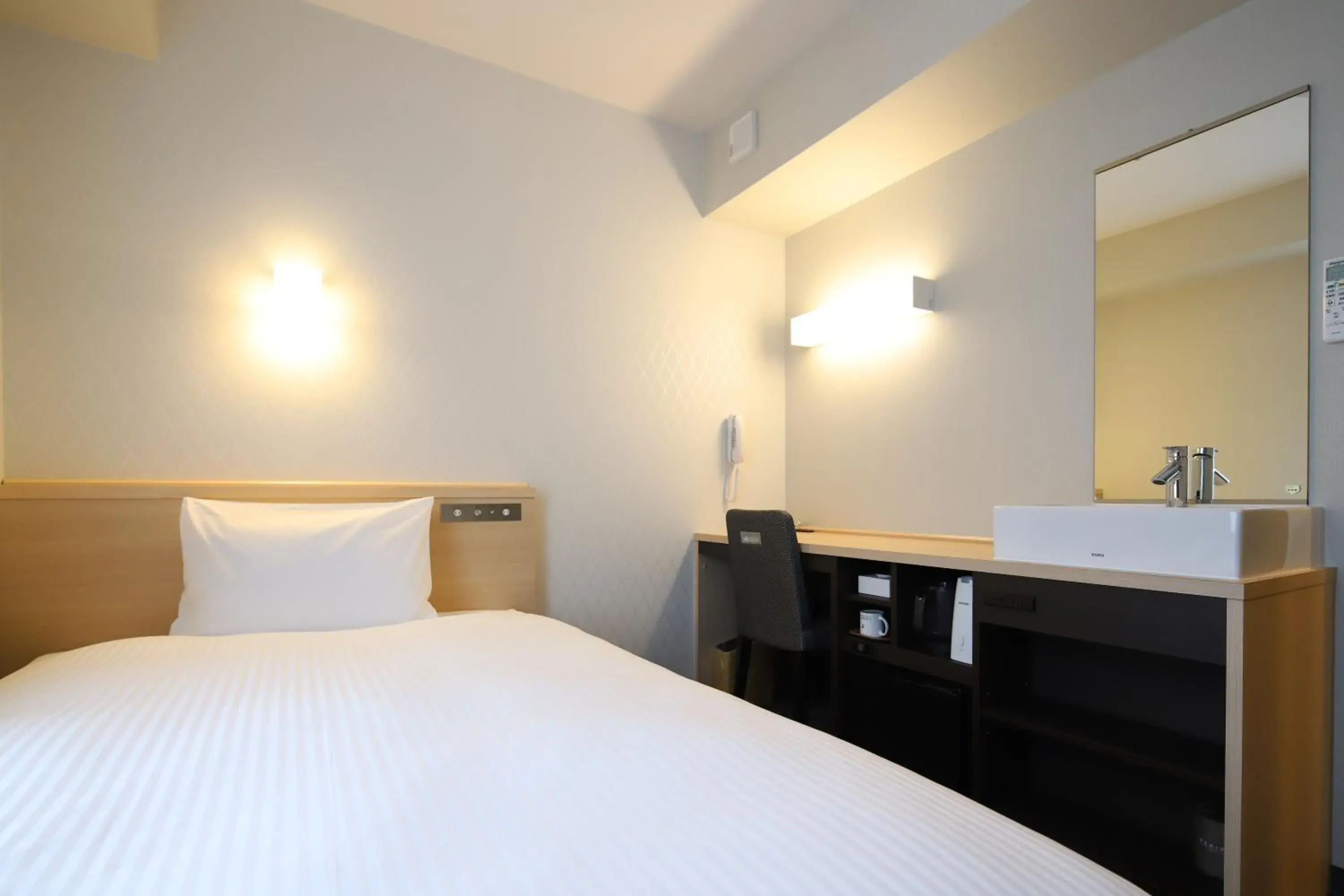 Bed in AB Hotel Osaka Sakaisuji Hommachi Bed in AB Hotel Osaka Sakaisuji Hommachi