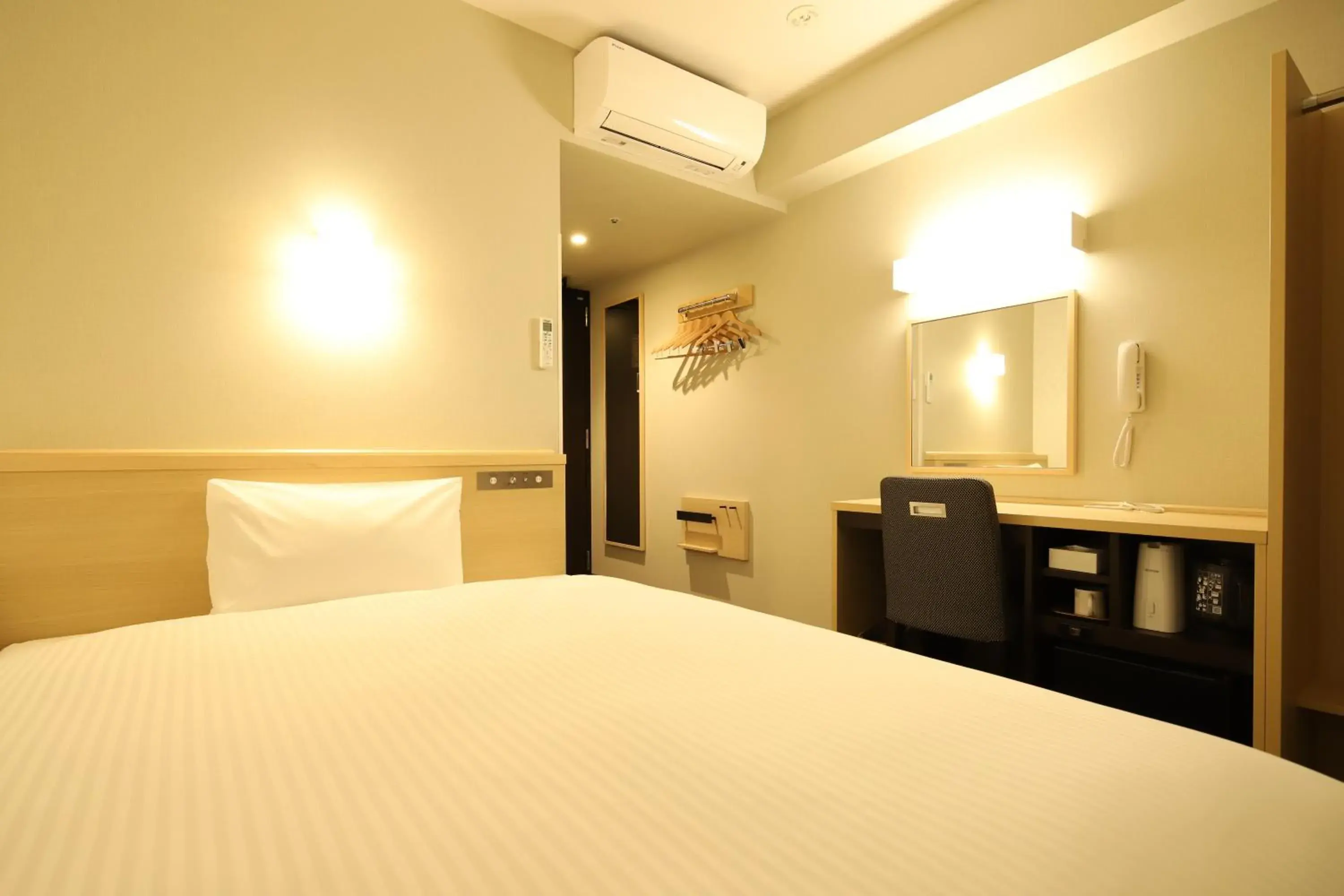 Bed in AB Hotel Osaka Sakaisuji Hommachi Bed in AB Hotel Osaka Sakaisuji Hommachi