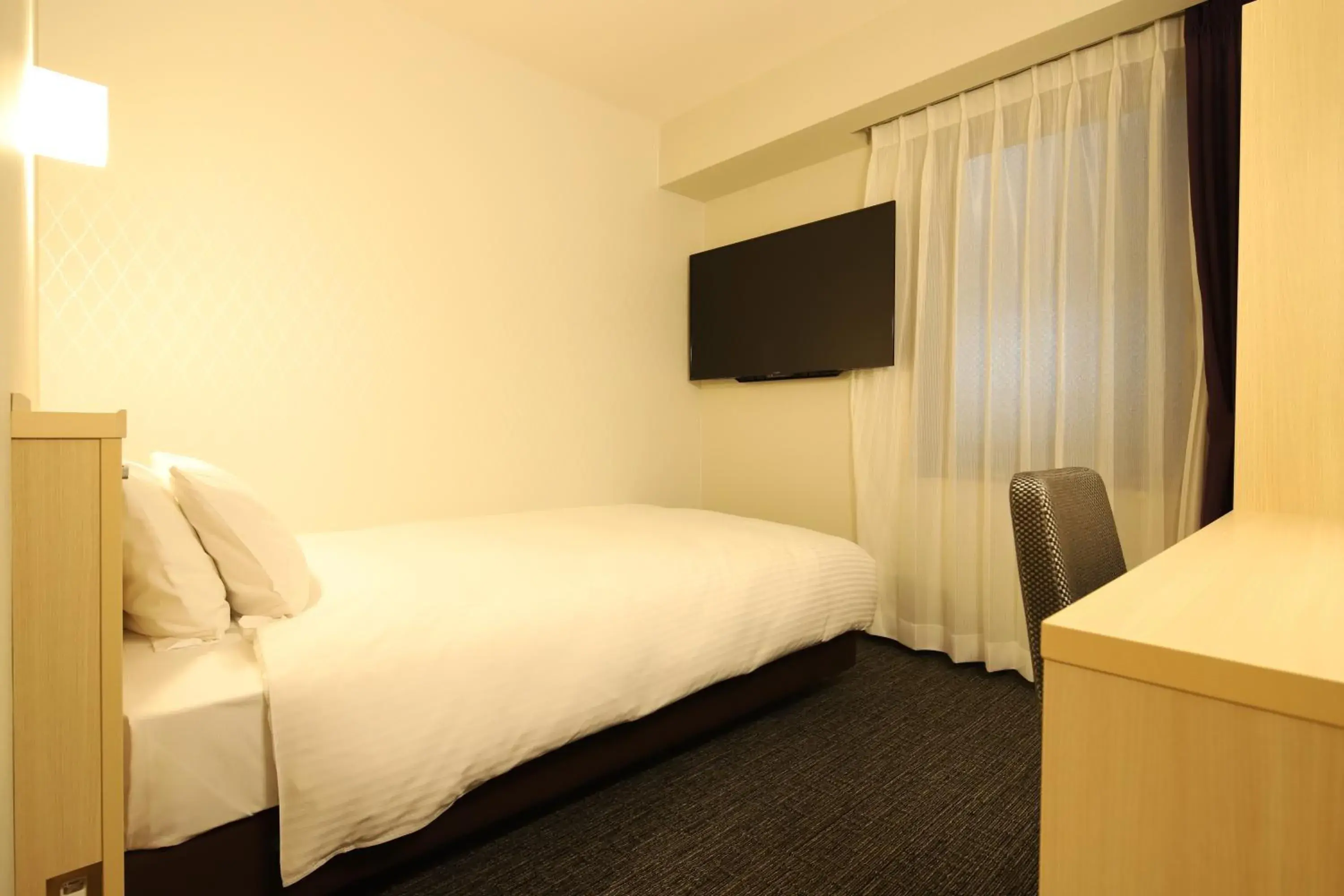 Bed in AB Hotel Osaka Sakaisuji Hommachi Bed in AB Hotel Osaka Sakaisuji Hommachi