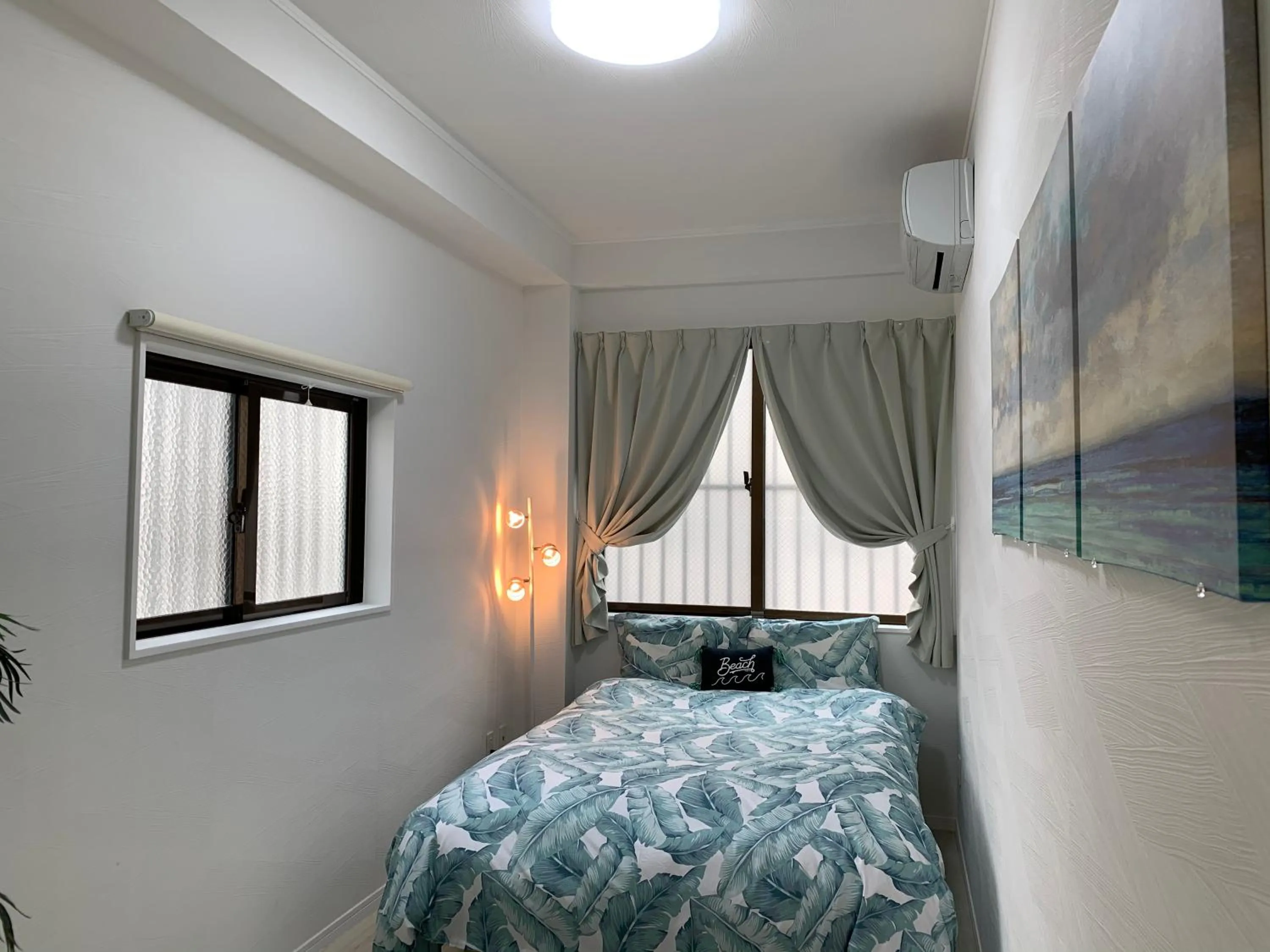 Bedroom, Bed in Maximum of 21 people can be rented in one building 3 minutes walk to Tomari Port 10 minutes drive to the airport No parking lot 30 seconds walk from paid parking lot warayunso port city May