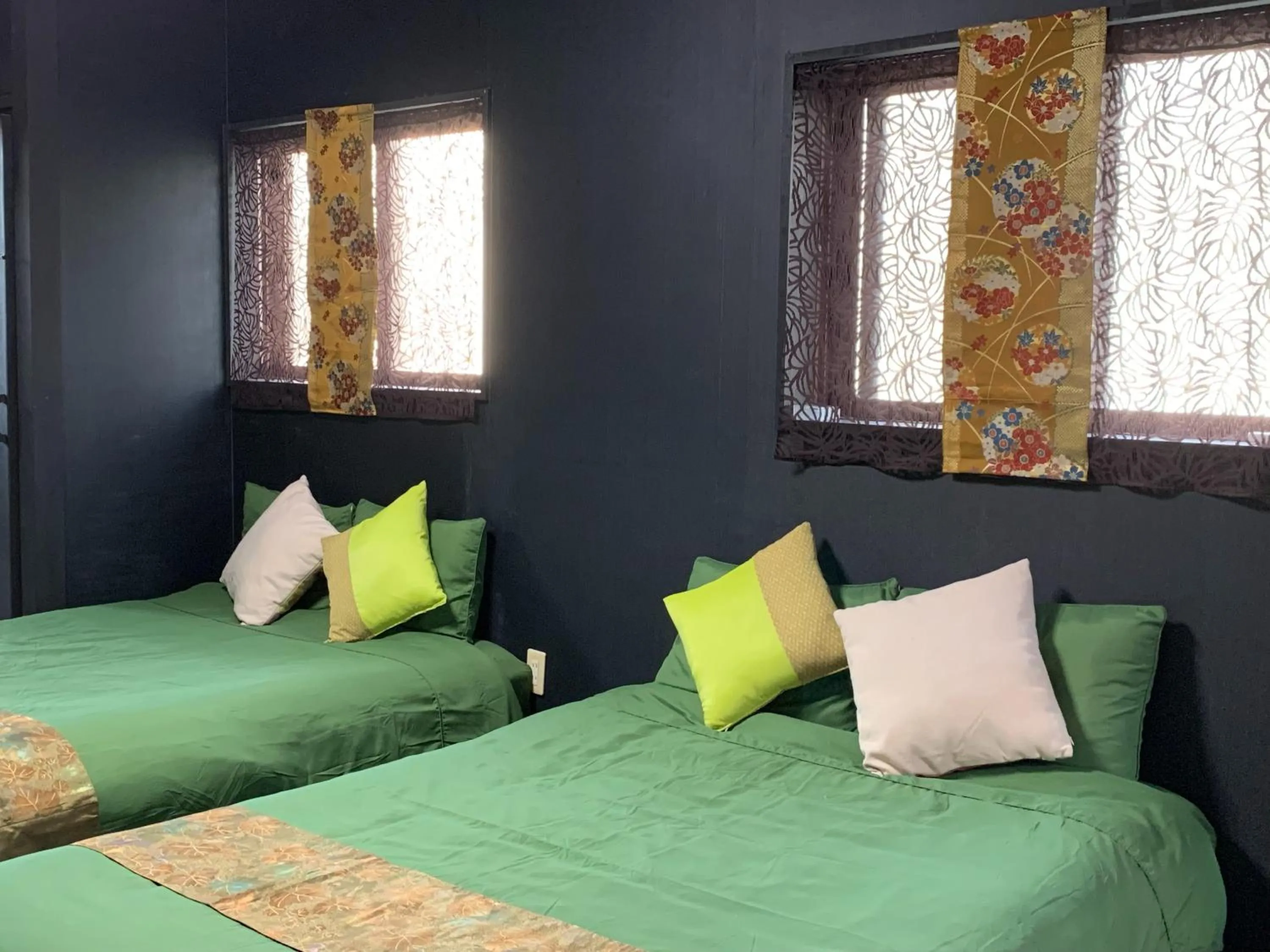 Bedroom, Bed in Maximum of 21 people can be rented in one building 3 minutes walk to Tomari Port 10 minutes drive to the airport No parking lot 30 seconds walk from paid parking lot warayunso port city May