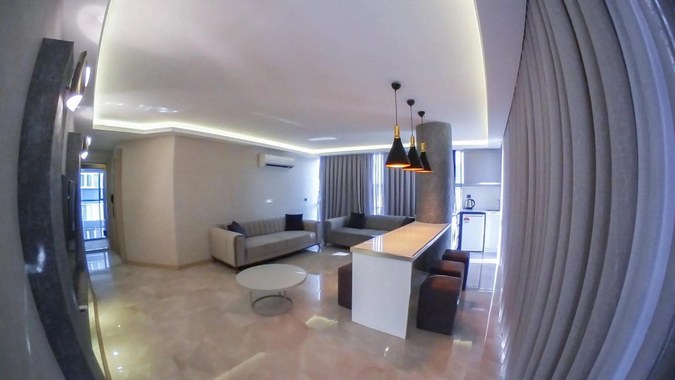 Kitchen or kitchenette in Le Luxe Suites Hotel